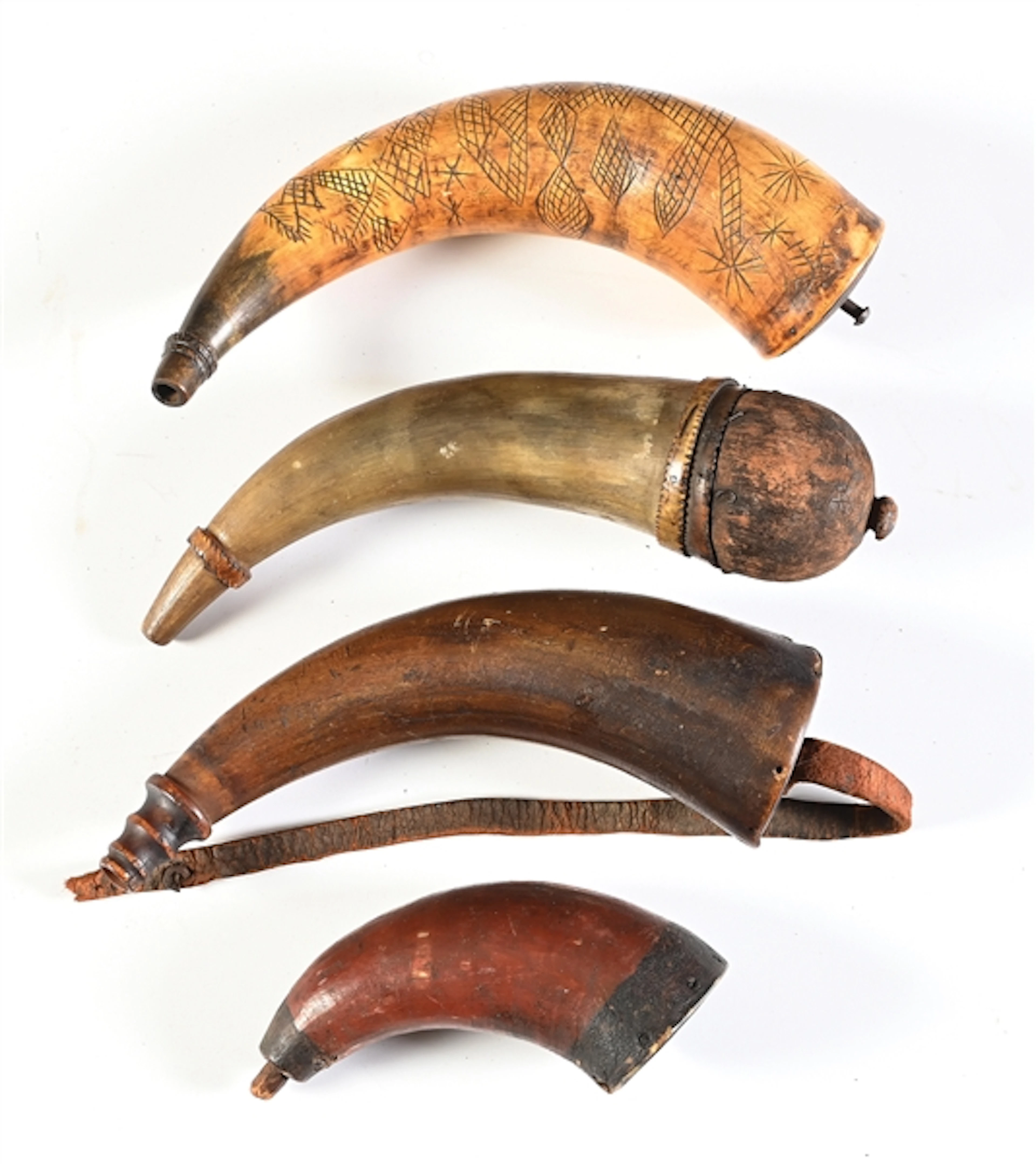 LOT OF 4: ANTIQUE POWDER HORNS.
