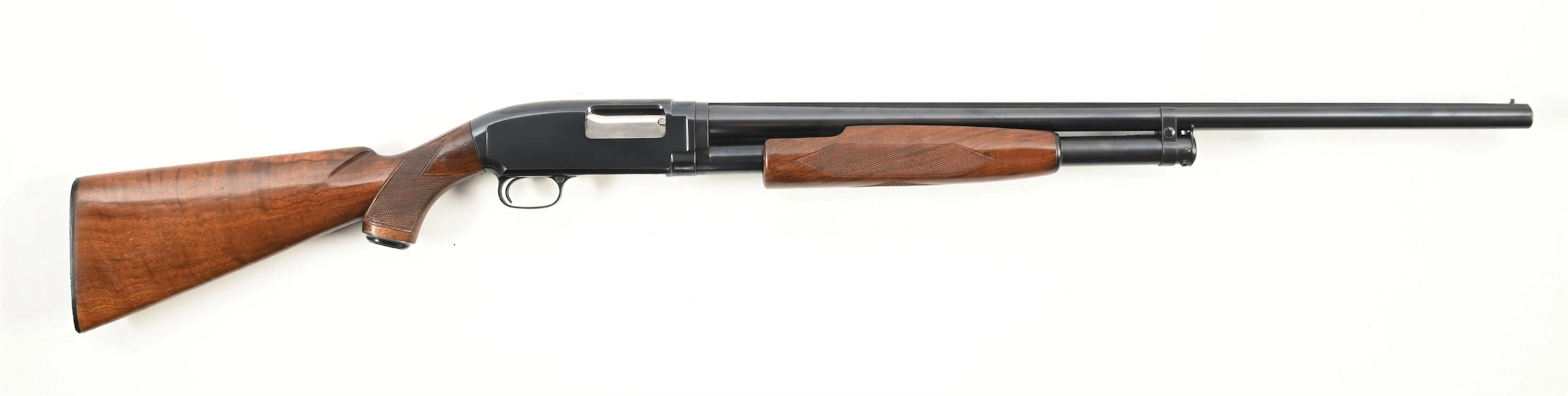 (C) HIGH CONDITION DELUXE WINCHESTER MODEL 12 SLIDE ACTION SHOTGUN.