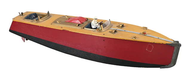 VINTAGE WOODEN ORKIN TOY SPEEDBOAT WITH YELLOW/RED HULL AND DRIVER
