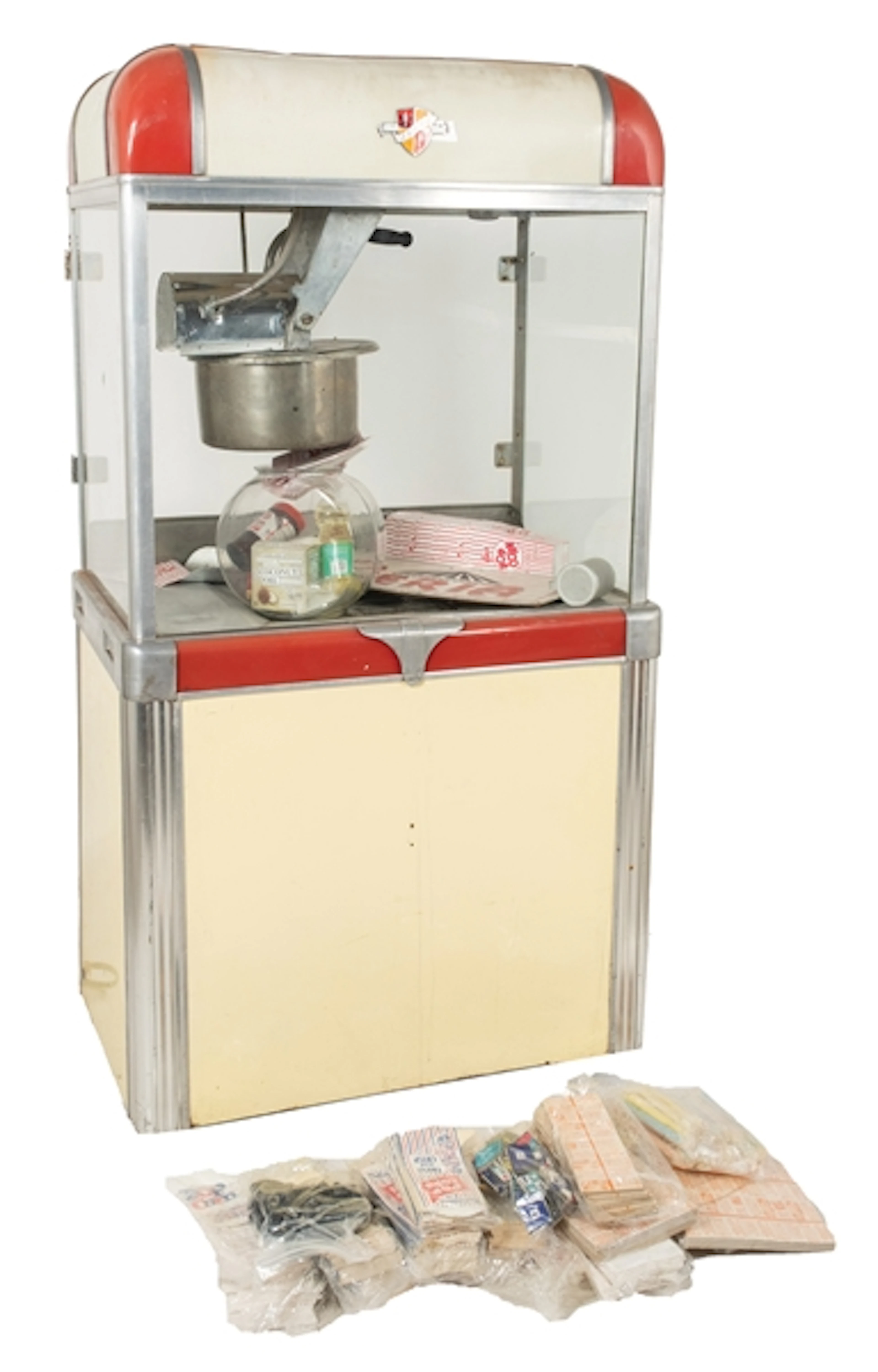 MANLEY MODEL 49 POPCORN MACHINE WITH CONCESSION ITEMS INSIDE AND TWO