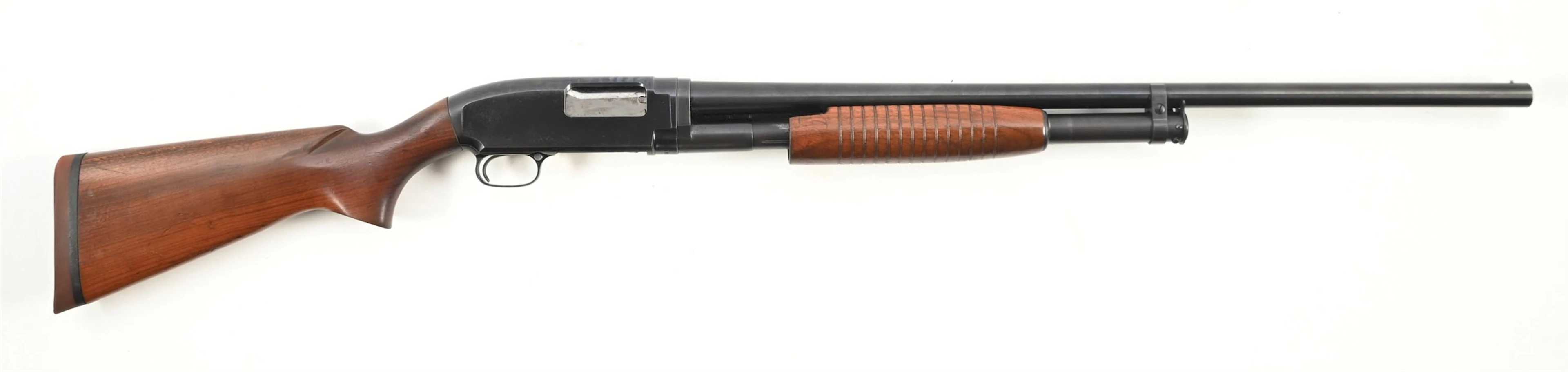 (C) WINCHESTER MODEL 12 SLIDE ACTION SHOTGUN.