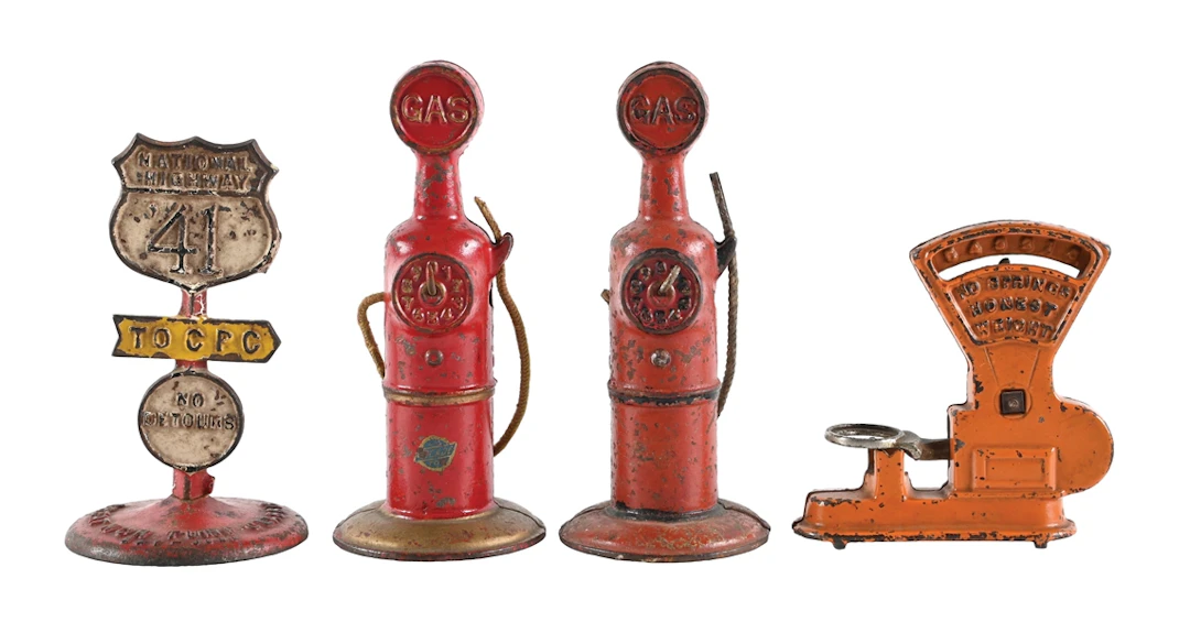 LOT OF 4: CAST-IRON TOY GAS PUMPS AND AUTOMOTIVE ACCESSORIES