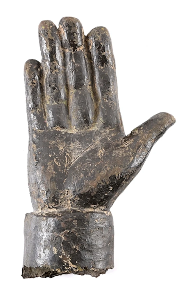 THE HAND THAT RULED IRAQ: SADDAM HUSSEIN BRONZE STATUE FRAGMENT FROM