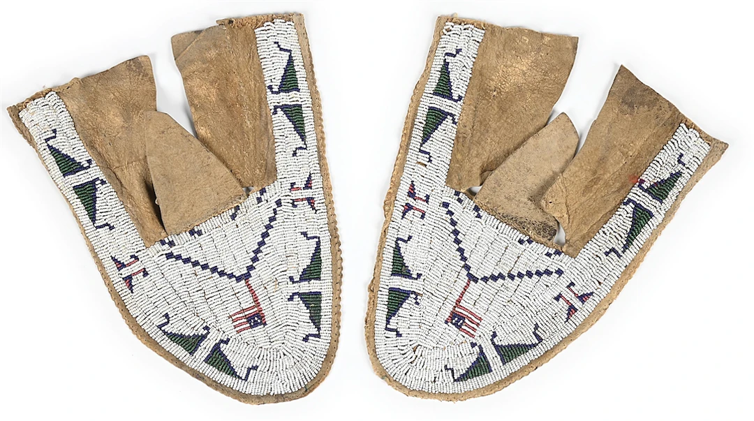 A PAIR OF SIOUX (LAKOTA) MOCCASIN UPPERS