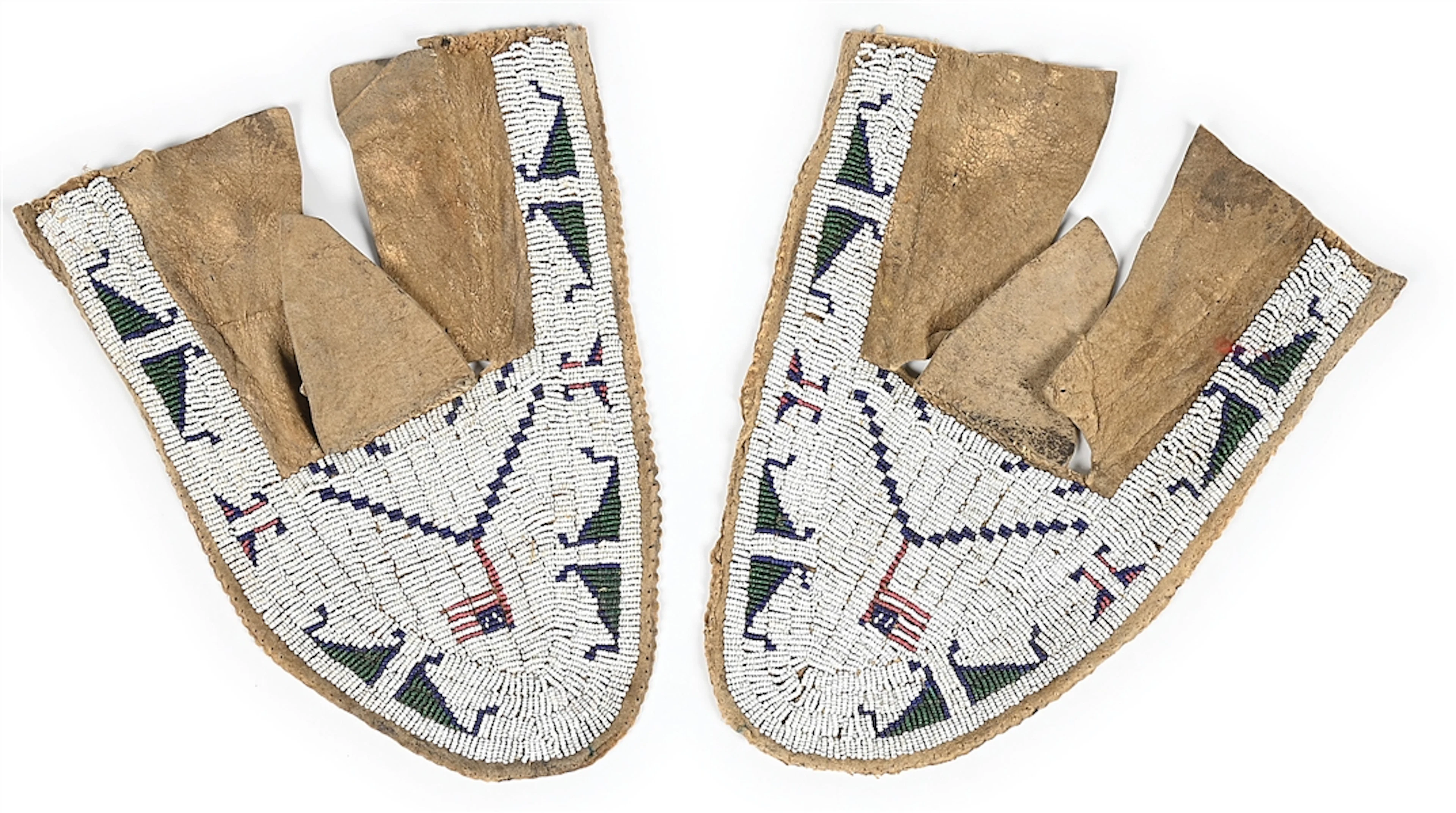 A PAIR OF SIOUX (LAKOTA) MOCCASIN UPPERS