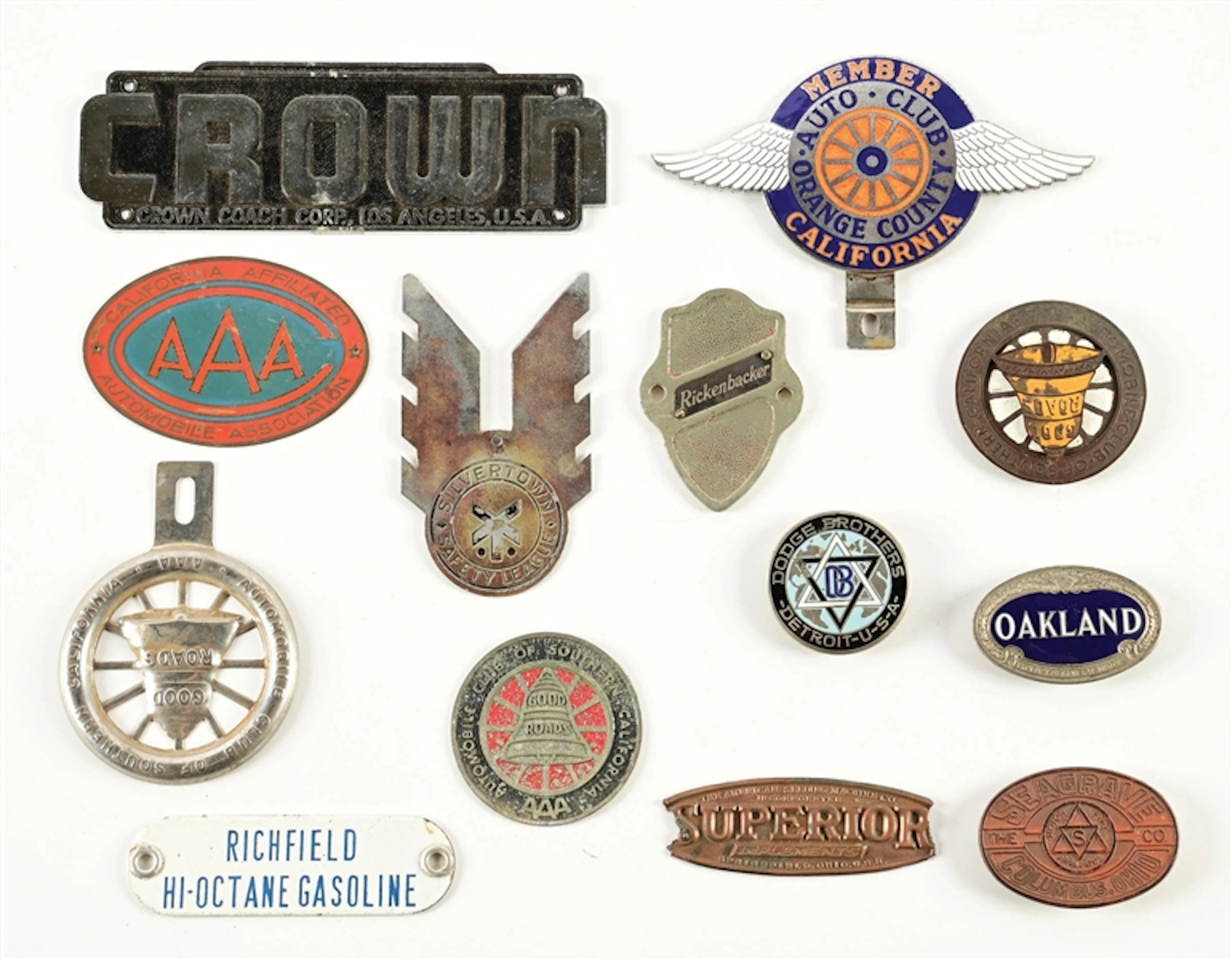 COLLECTION OF 13: ASSORTED CAR RADIATOR BADGES AND LICENSE TOPPERS