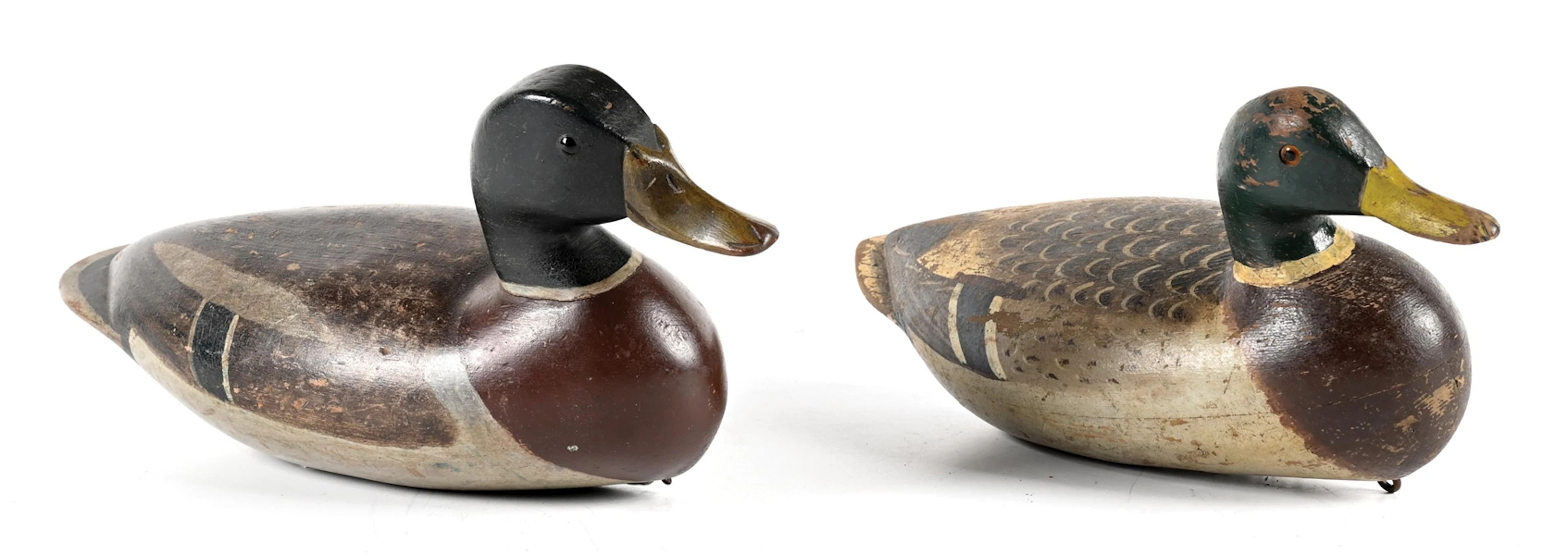 A PAIR OF VINTAGE WOODEN DUCK DECOYS