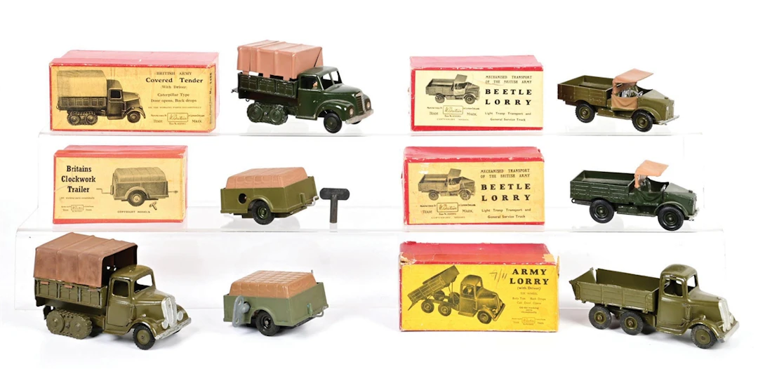 LOT OF 7: W. BRITAINS POST-WAR MECHANIZED TRANSPORTS