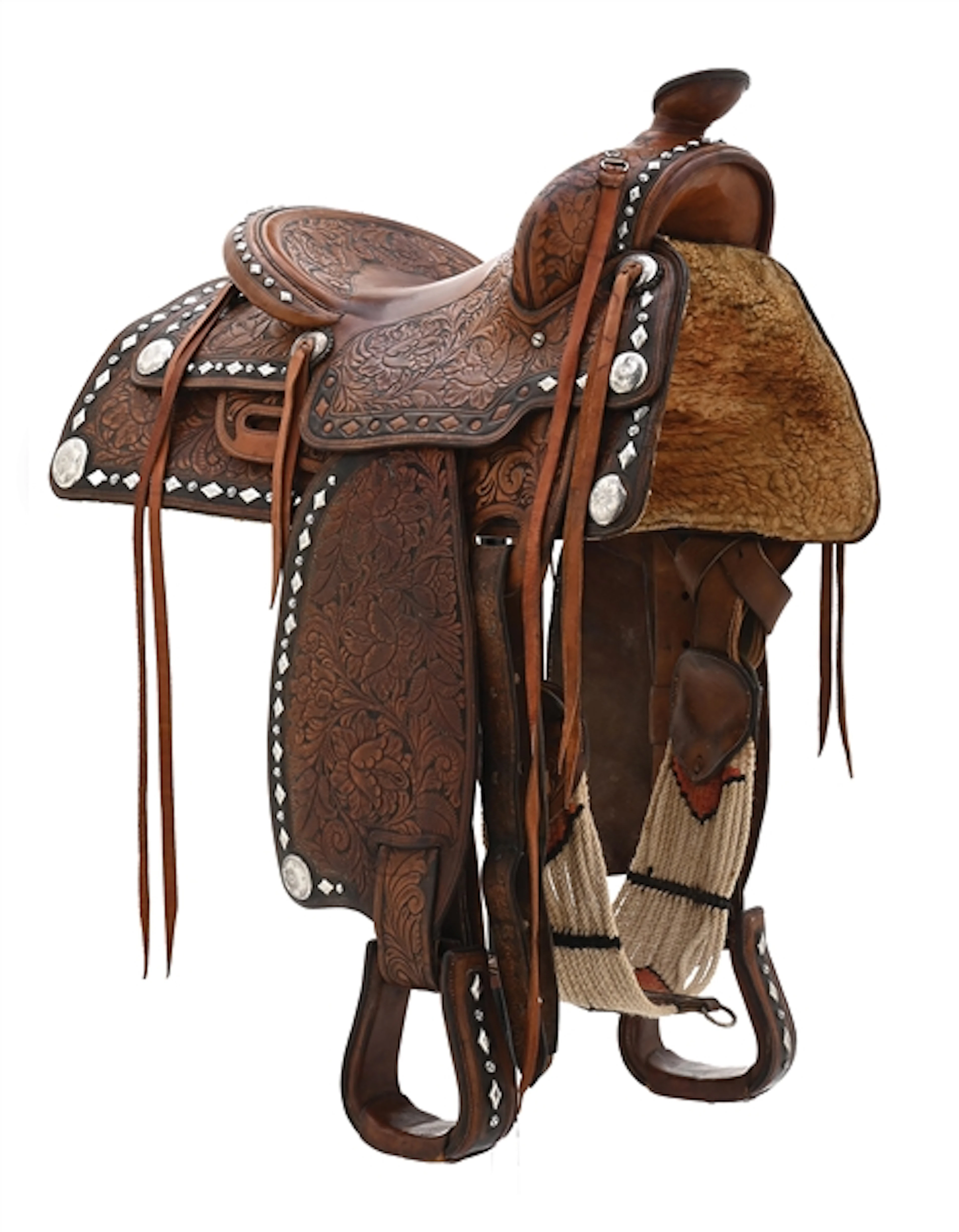 EDWARD H. BOHLIN FLORAL AND STUDDED HAND-TOOLED LEATHER SADDLE