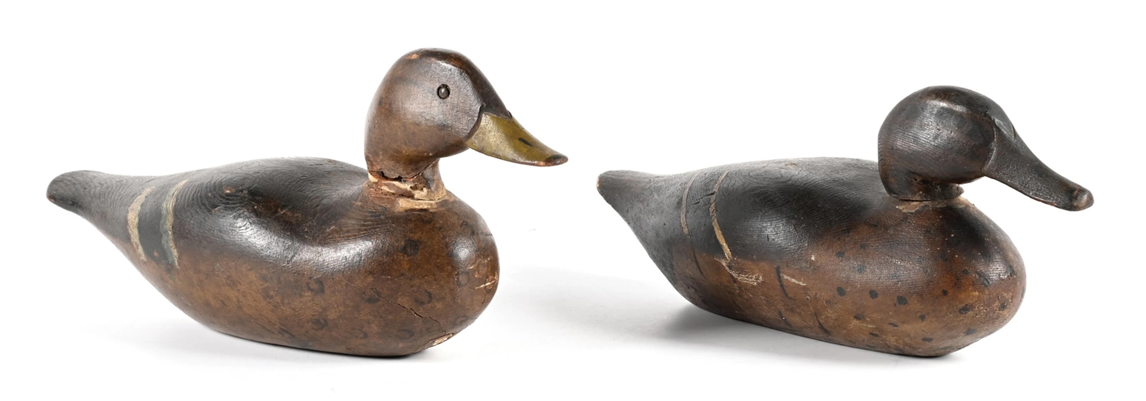 A PAIR OF VINTAGE WOODEN DUCK DECOYS