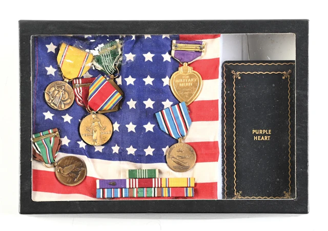US WWII NAMED PURPLE HEART MEDAL GROUPING.