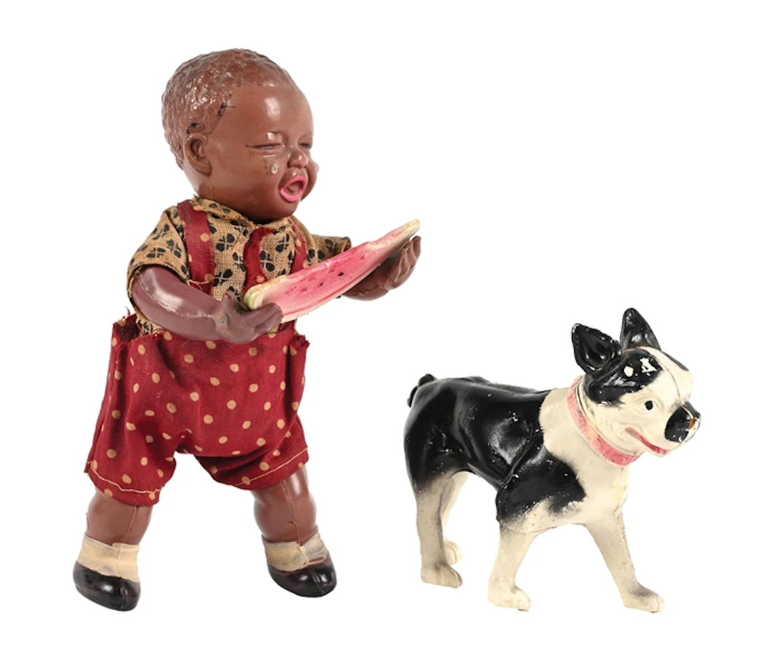 JAPANESE “POOR PETE” CELLULOID WIND-UP TOY
