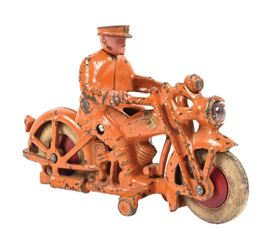 CAST IRON POLICE OFFICER MOTORCYCLE TOY.