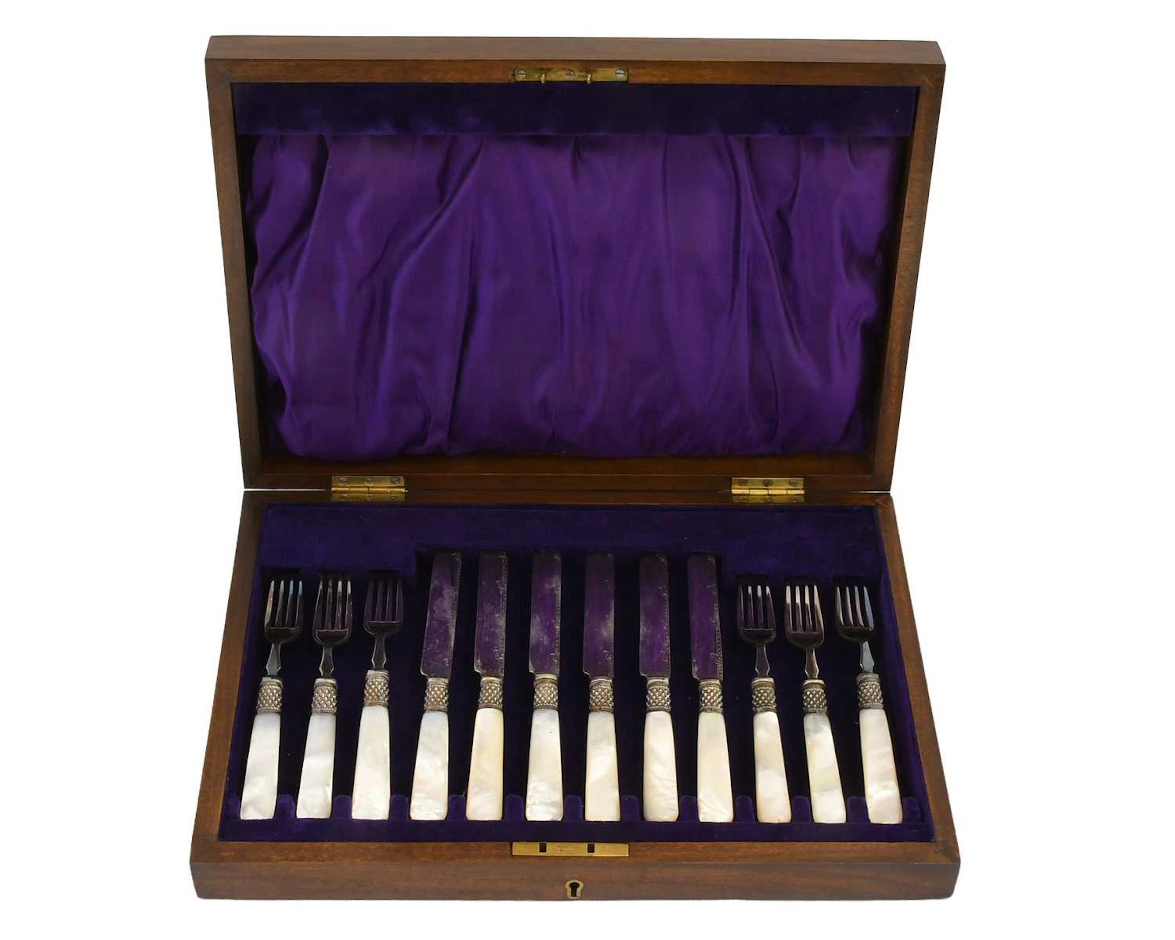 A Cased Set of Six Silver Plate and Mother-of-Pearl Eaters, First