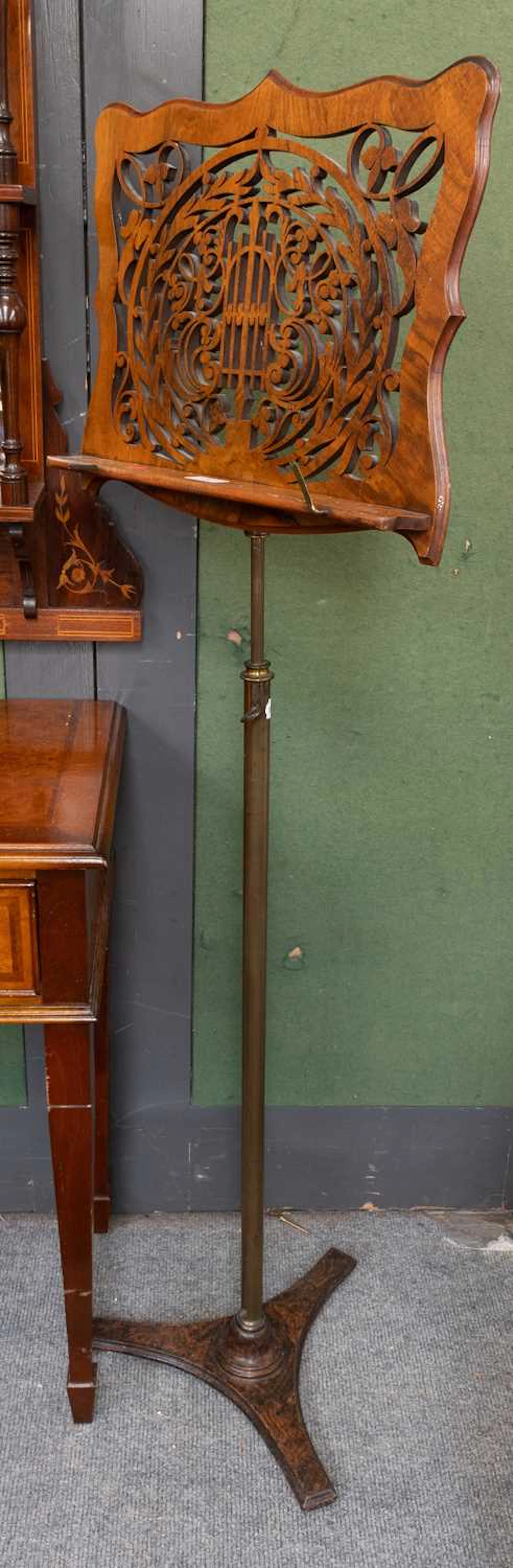 A Victorian Carved and Pierced Walnut Music Stand