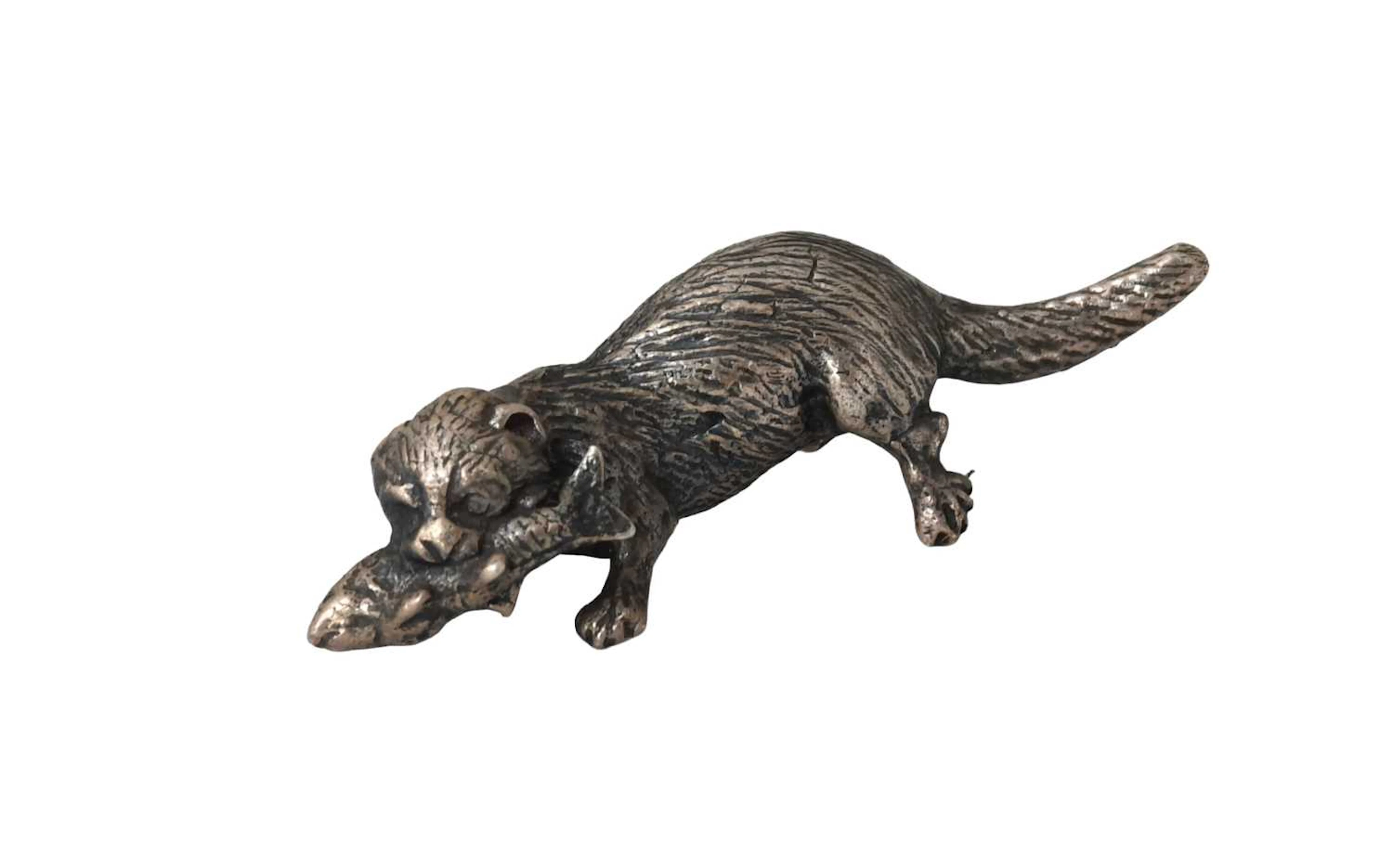 An Elizabeth II Silver Model of an Otter, Maker's Mark MM, London, 1973