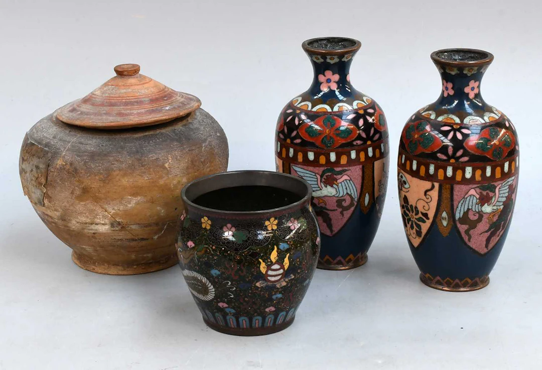 A Terracotta Jar and Cover From Antiquity