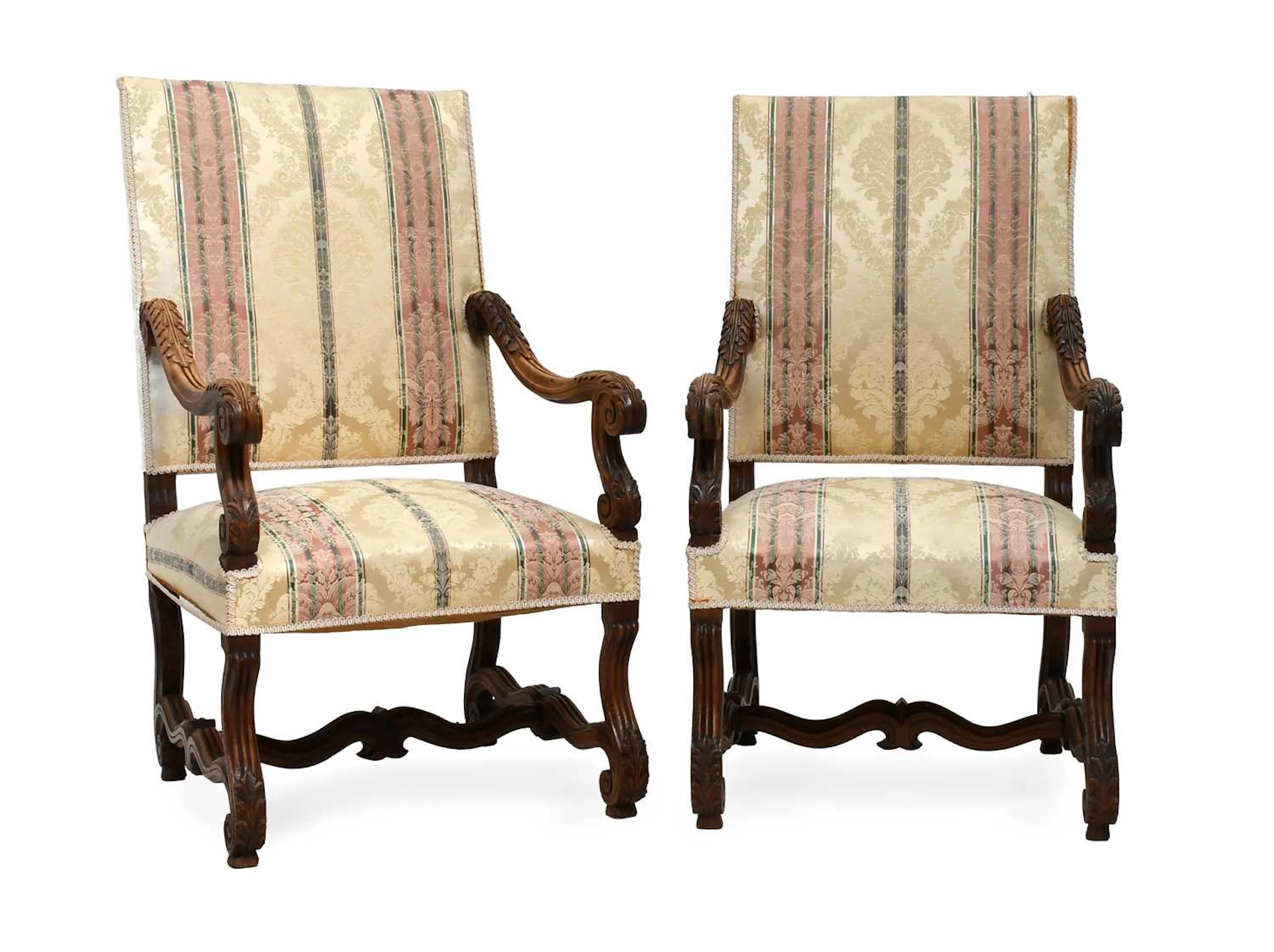 A Pair of Late 19th Century Carved Walnut Open Armchairs