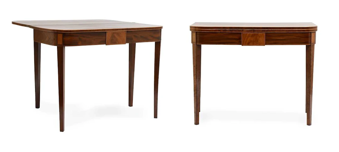 A Pair of George III Mahogany and Boxwood-Strung Foldover Tea Tables