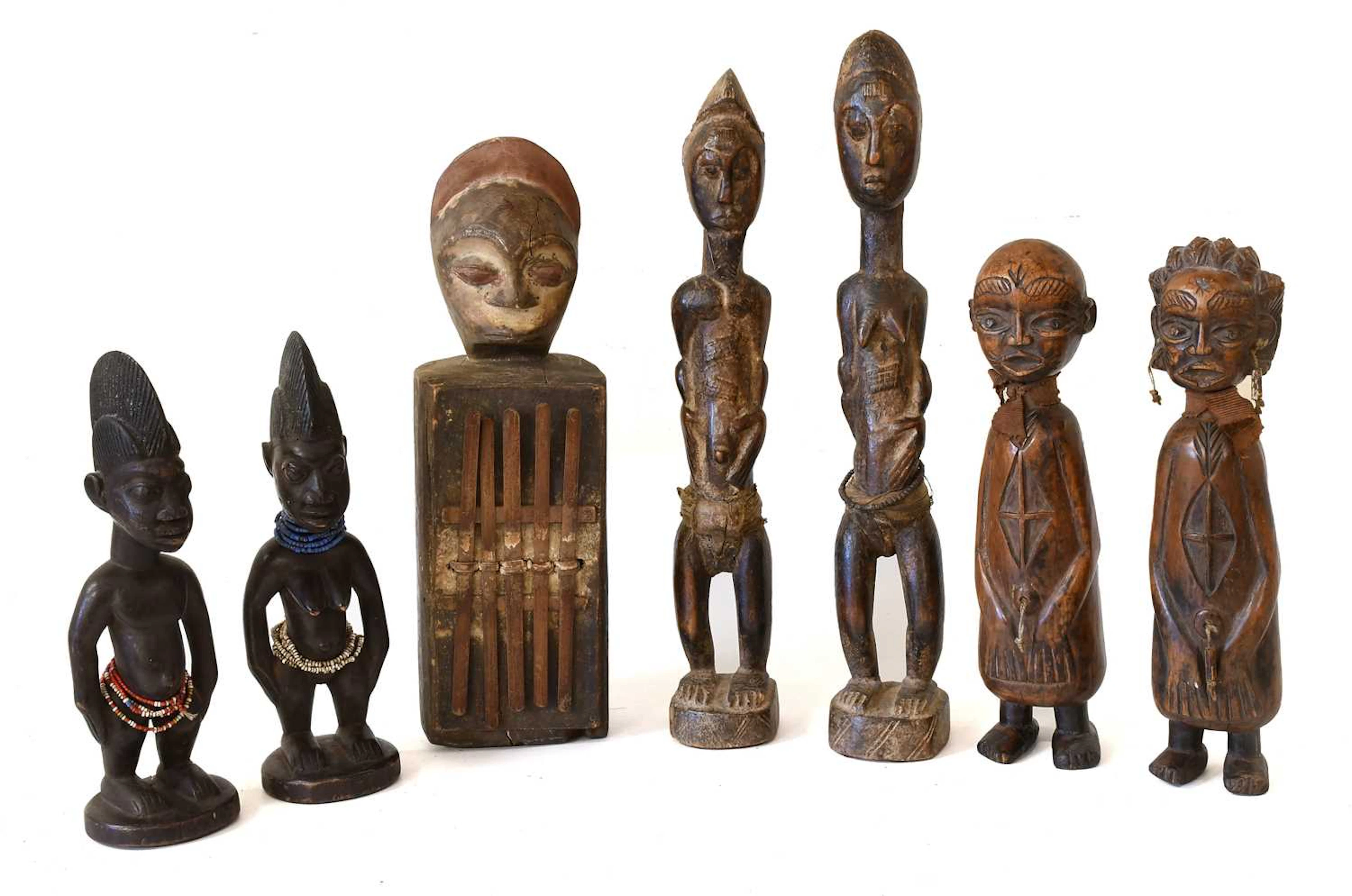 A Hemba, DRC Wood Thumb Piano, a Pair of Yoruba Ibeje, Nigeria, a