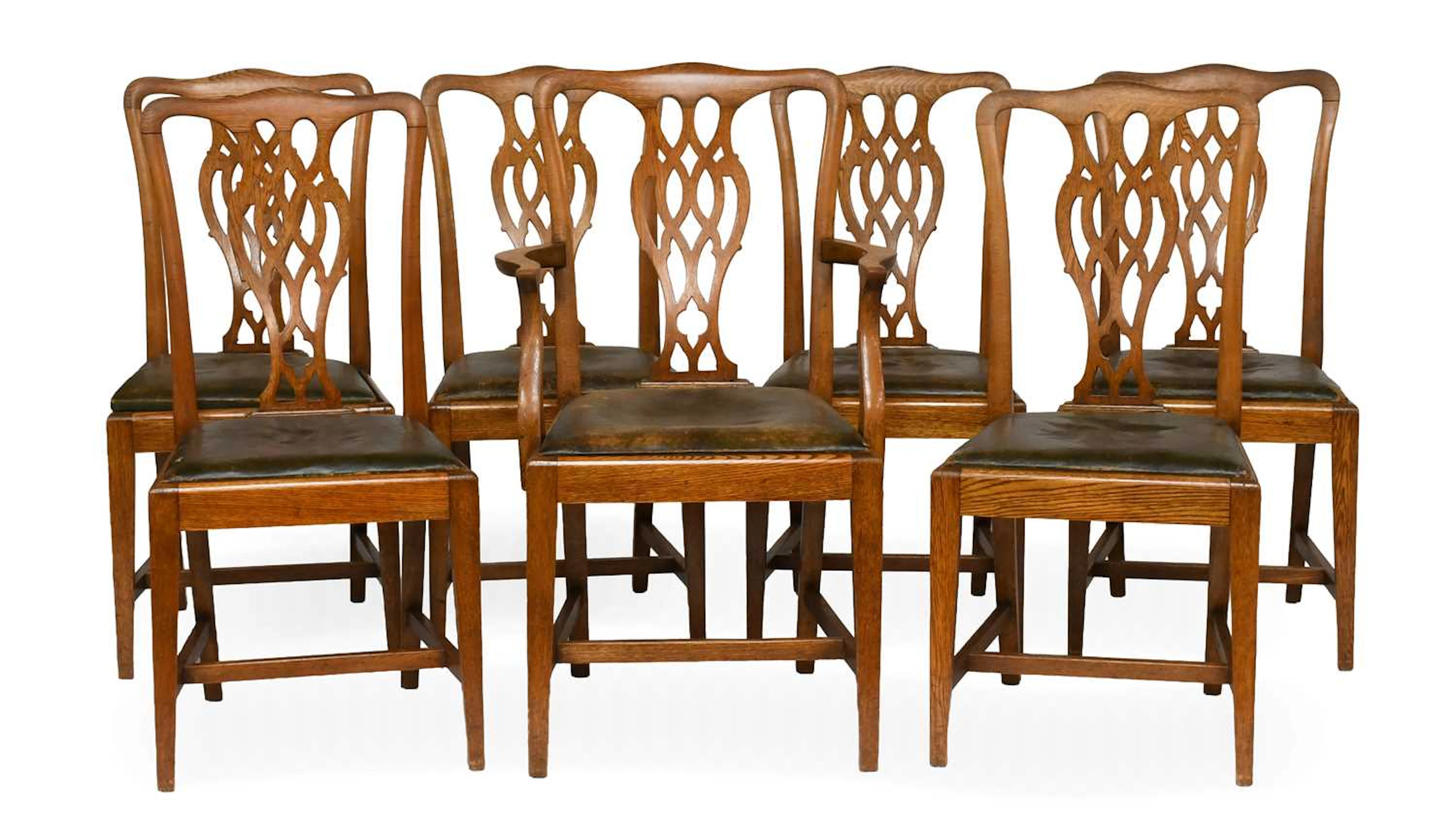 A Set of Seven Oak Dining Chairs