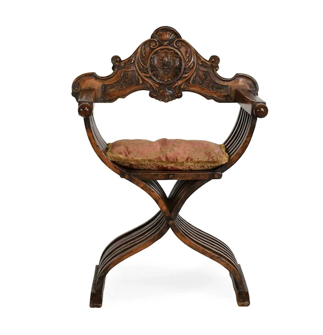 A 19th Century Italian Carved Walnut Savonarola Chair