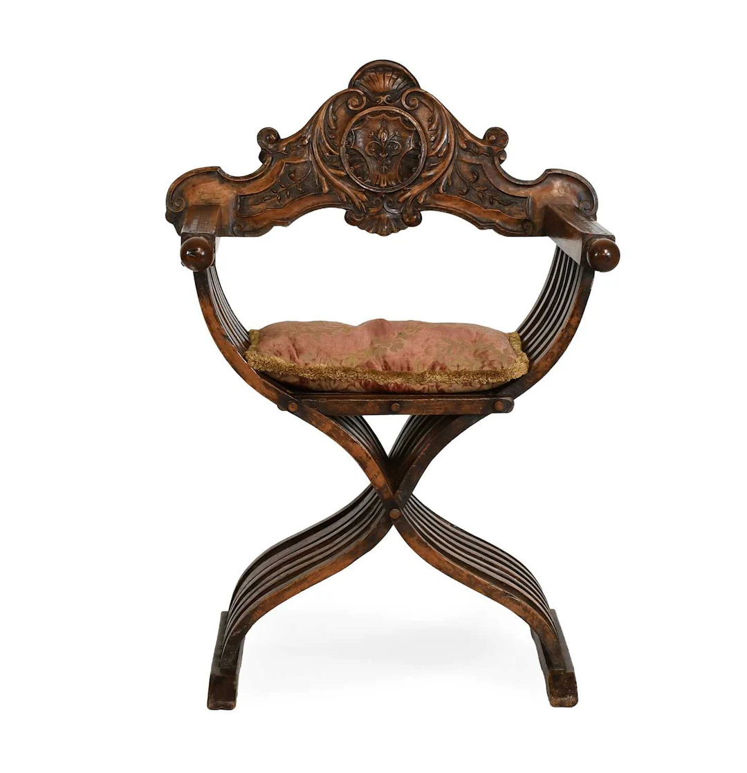 A 19th Century Italian Carved Walnut Savonarola Chair
