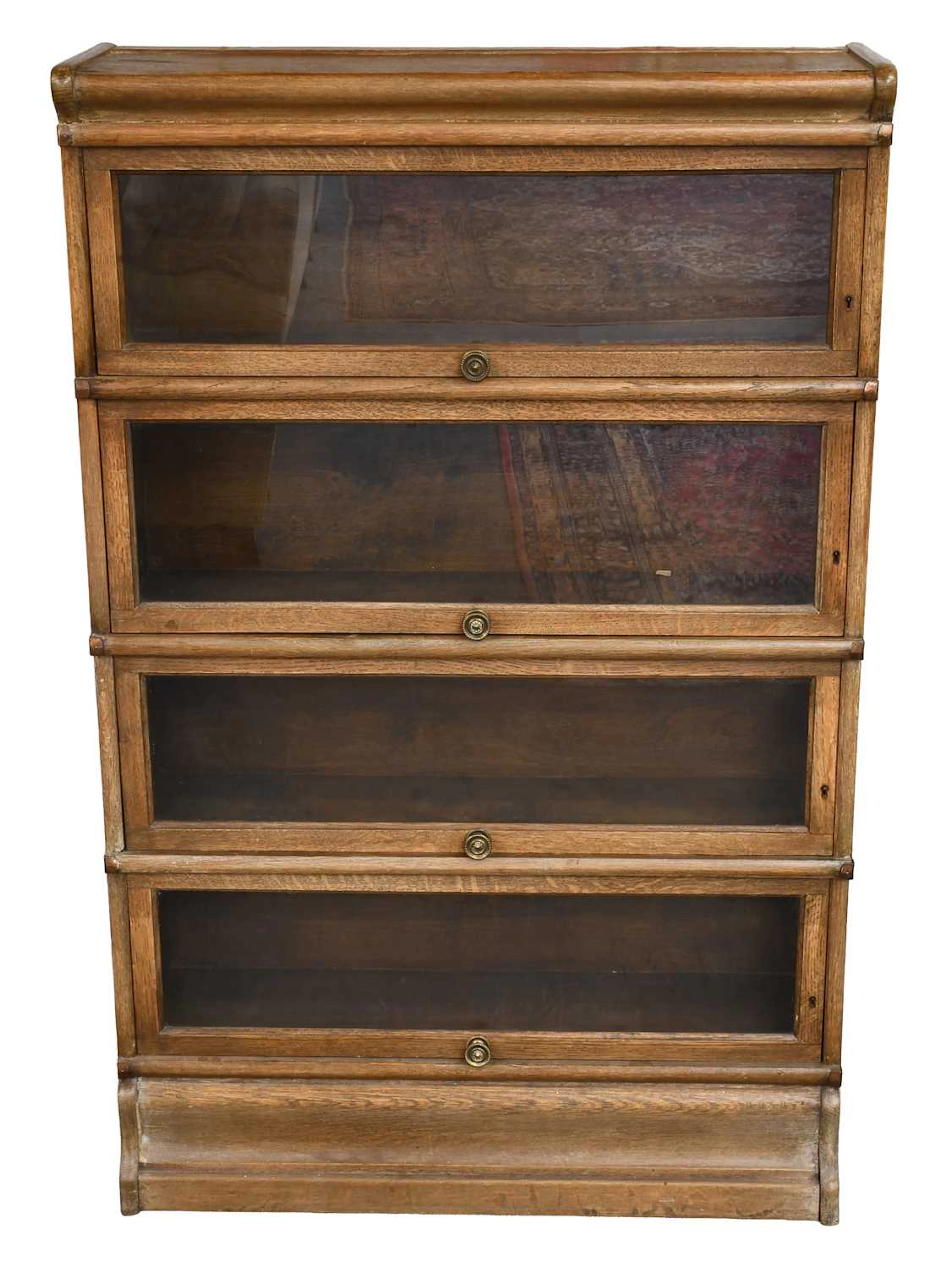 An Oak Four-Tier Sectional Bookcase