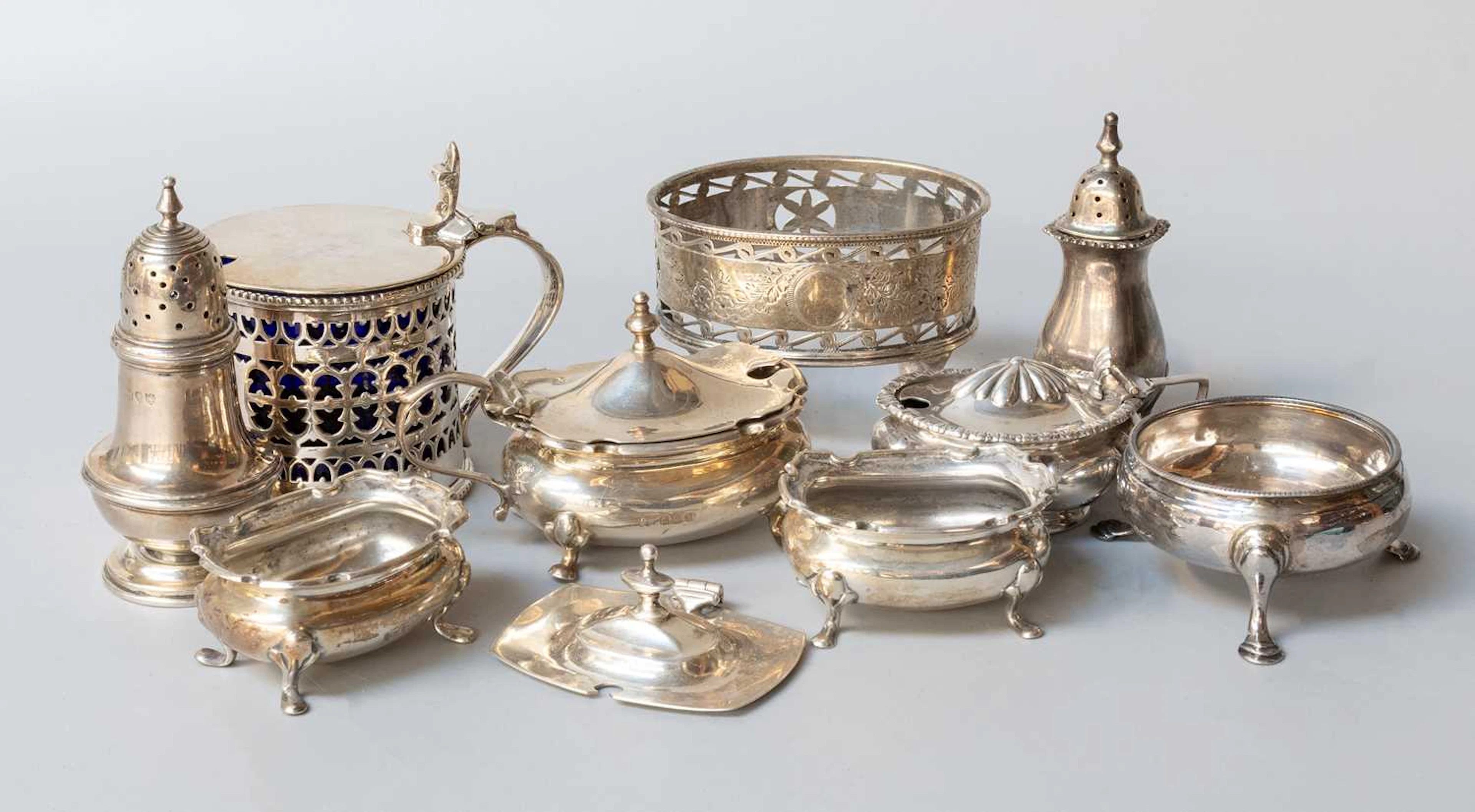 A Collection of Assorted Silver Condiment Items, Together With