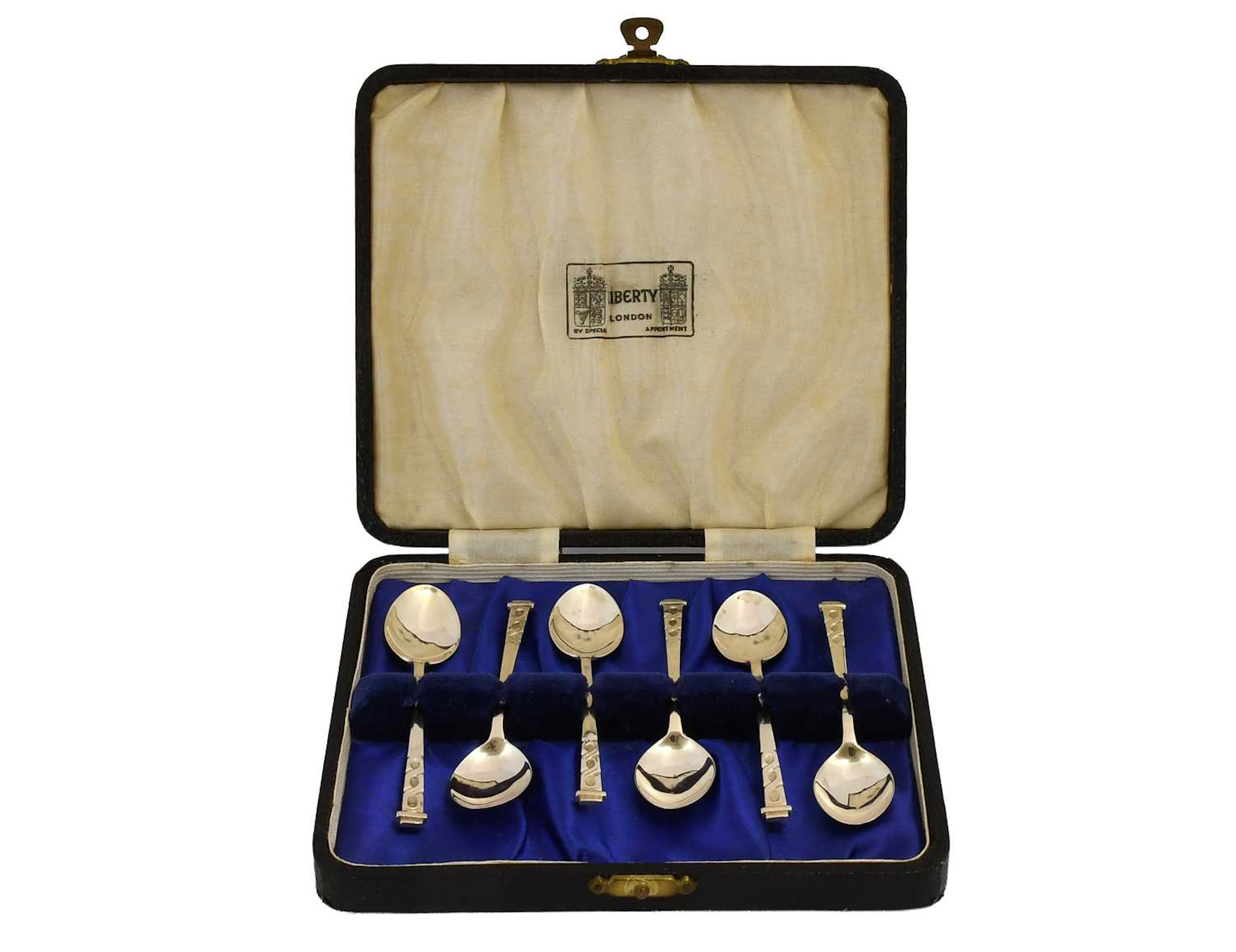 A Cased Set of Six George V Silver Coffee-Spoons, by Liberty and Co.