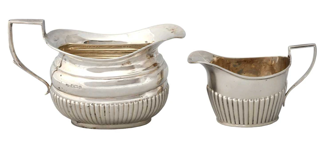 A Victorian or Edward VII Silver Cream-Jug and a Victorian Silver