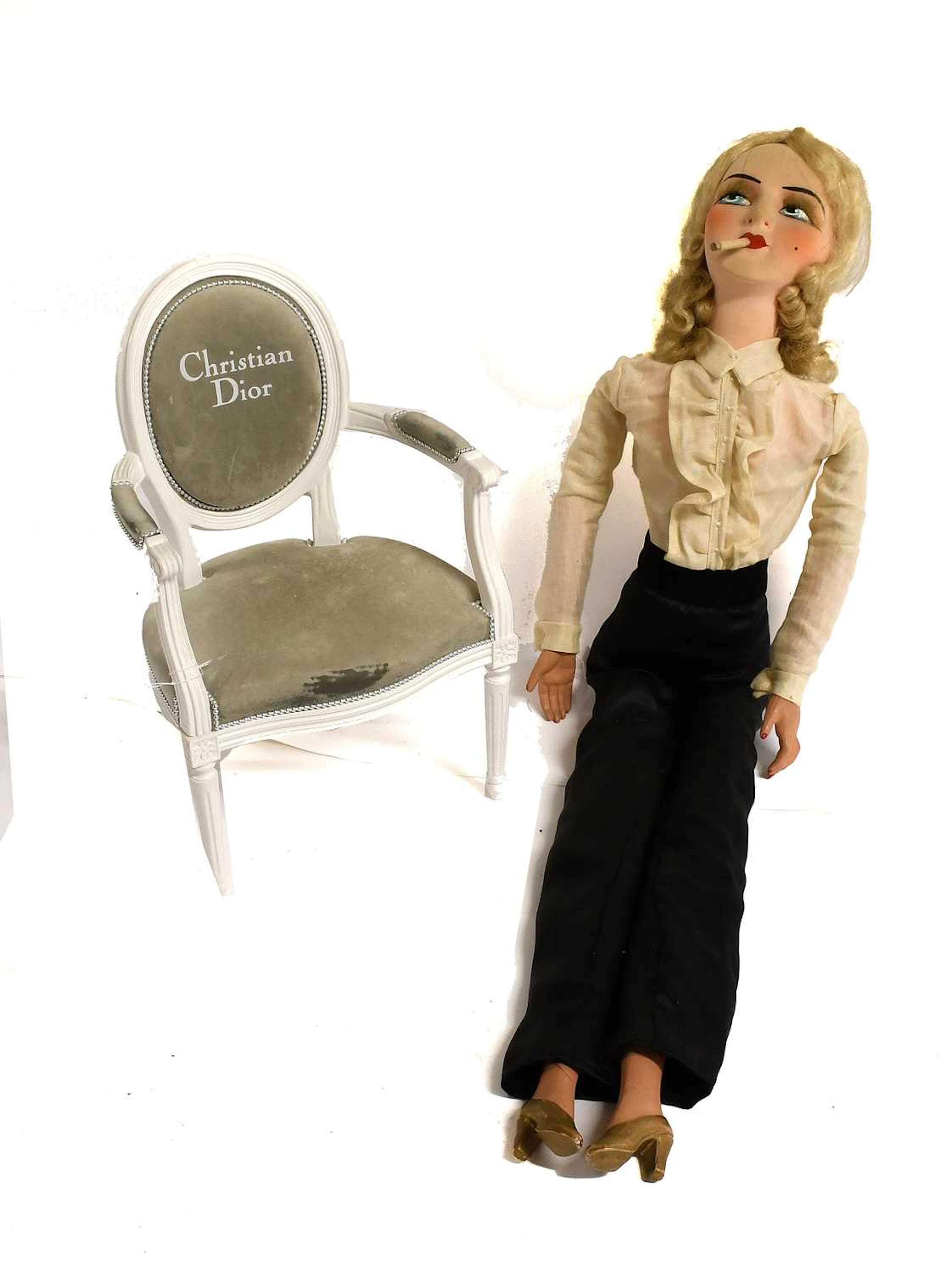 An Art Deco Boudoir Doll of Marlene Dietrich Smoking a Cigarette