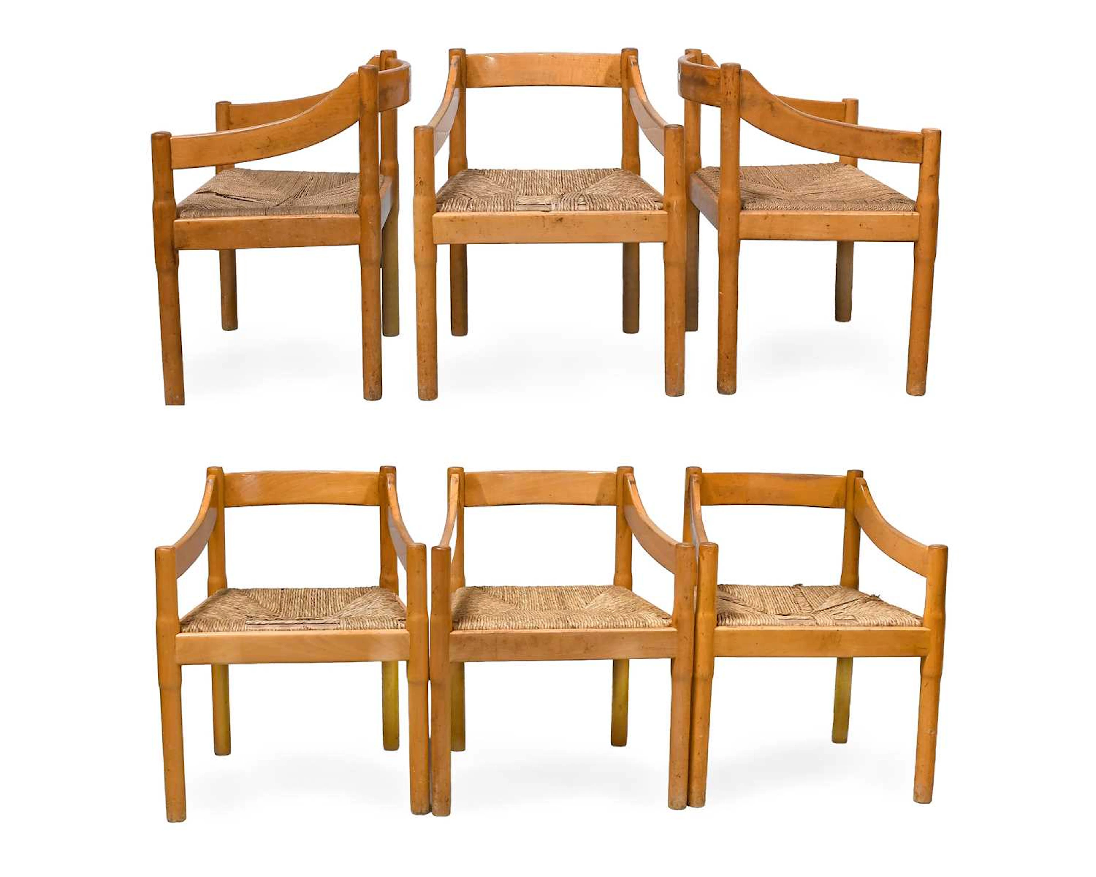 Vico Magistretti (Italian 1920-2006): A Set of Six Beech Carimate Armchairs