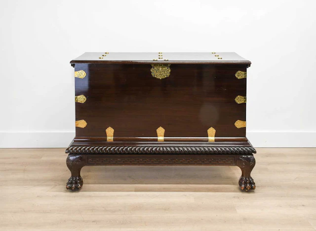 A Mahogany and Brass-Bound Chest on Stand, stamped GILLOWS, impressed