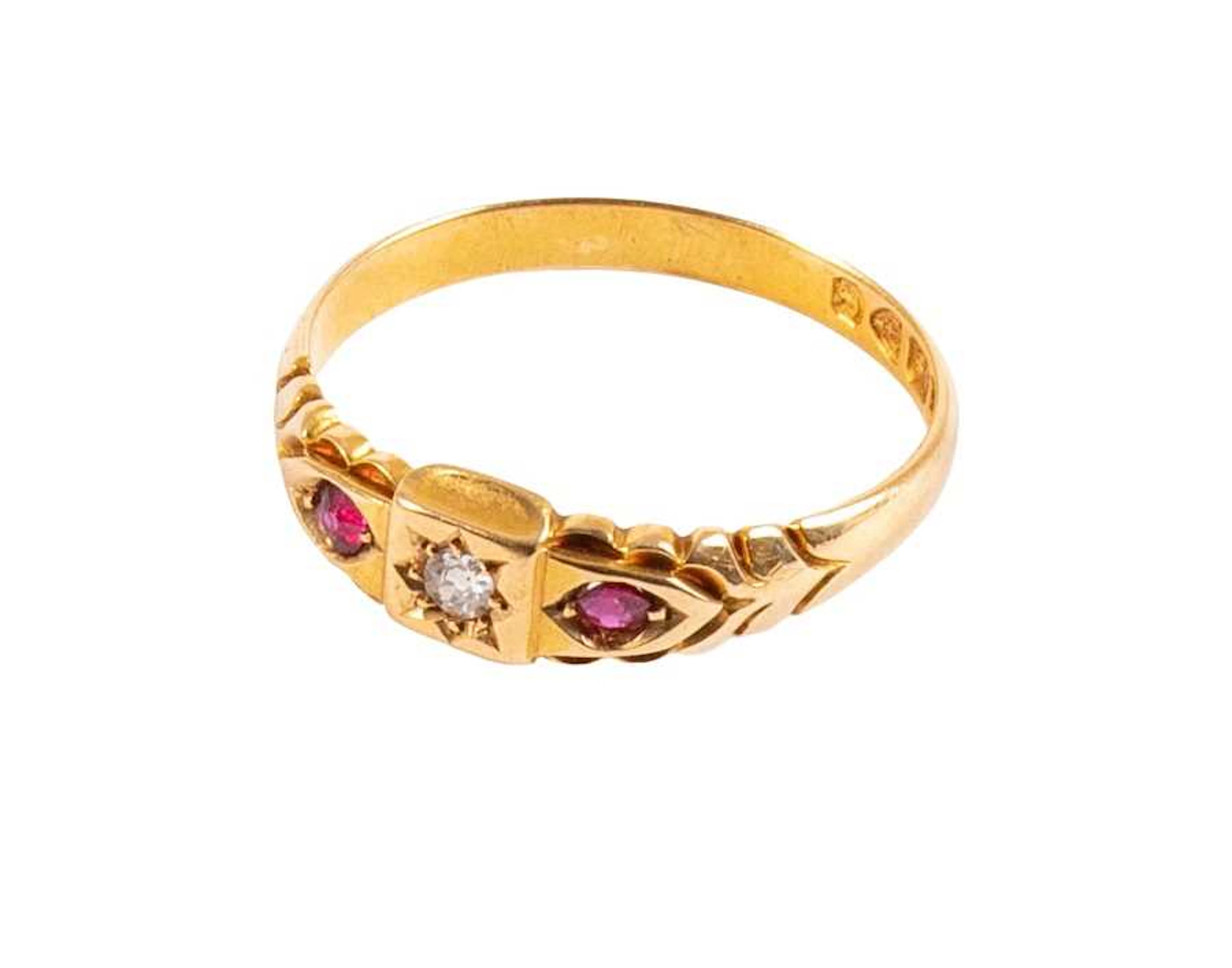 An 18 Carat Gold Ruby and Diamond Three Stone Ring