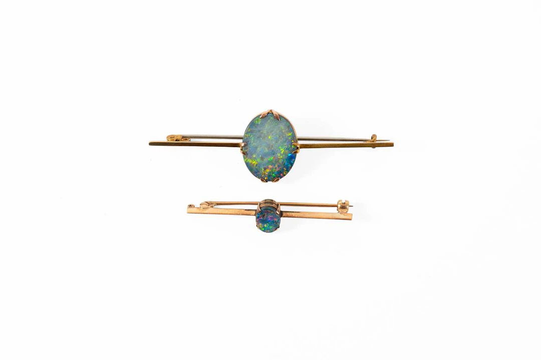 An Opal Doublet Bar Brooch, A Similar Brooch