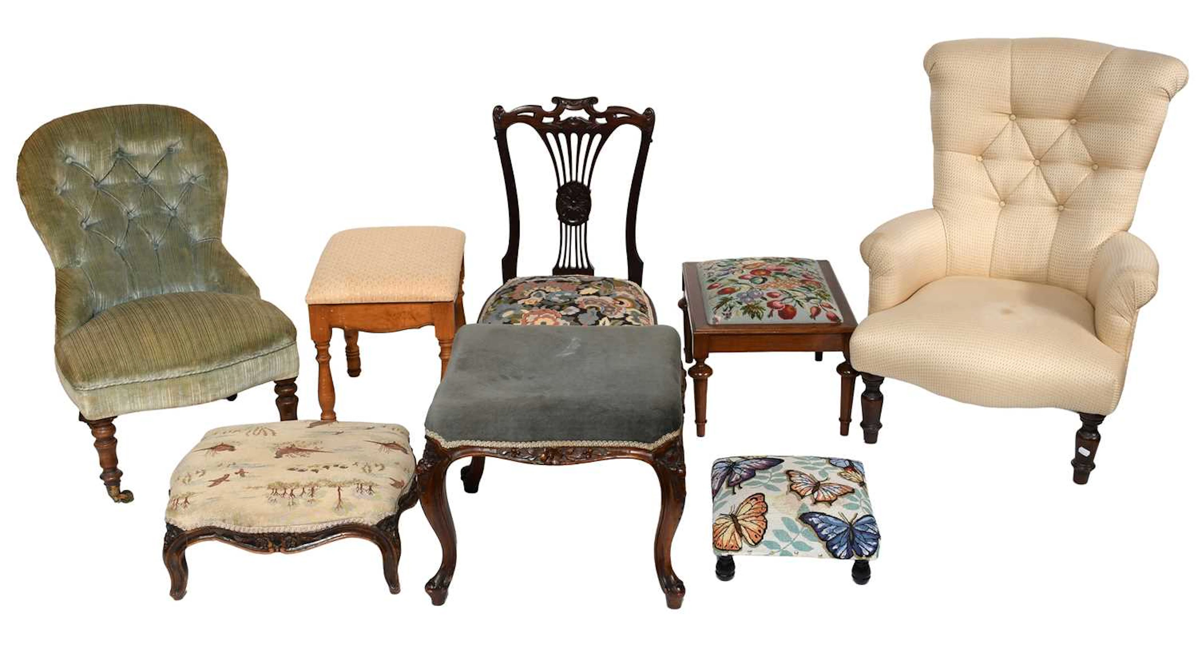 An Upholstered Buttoned-Back Armchair