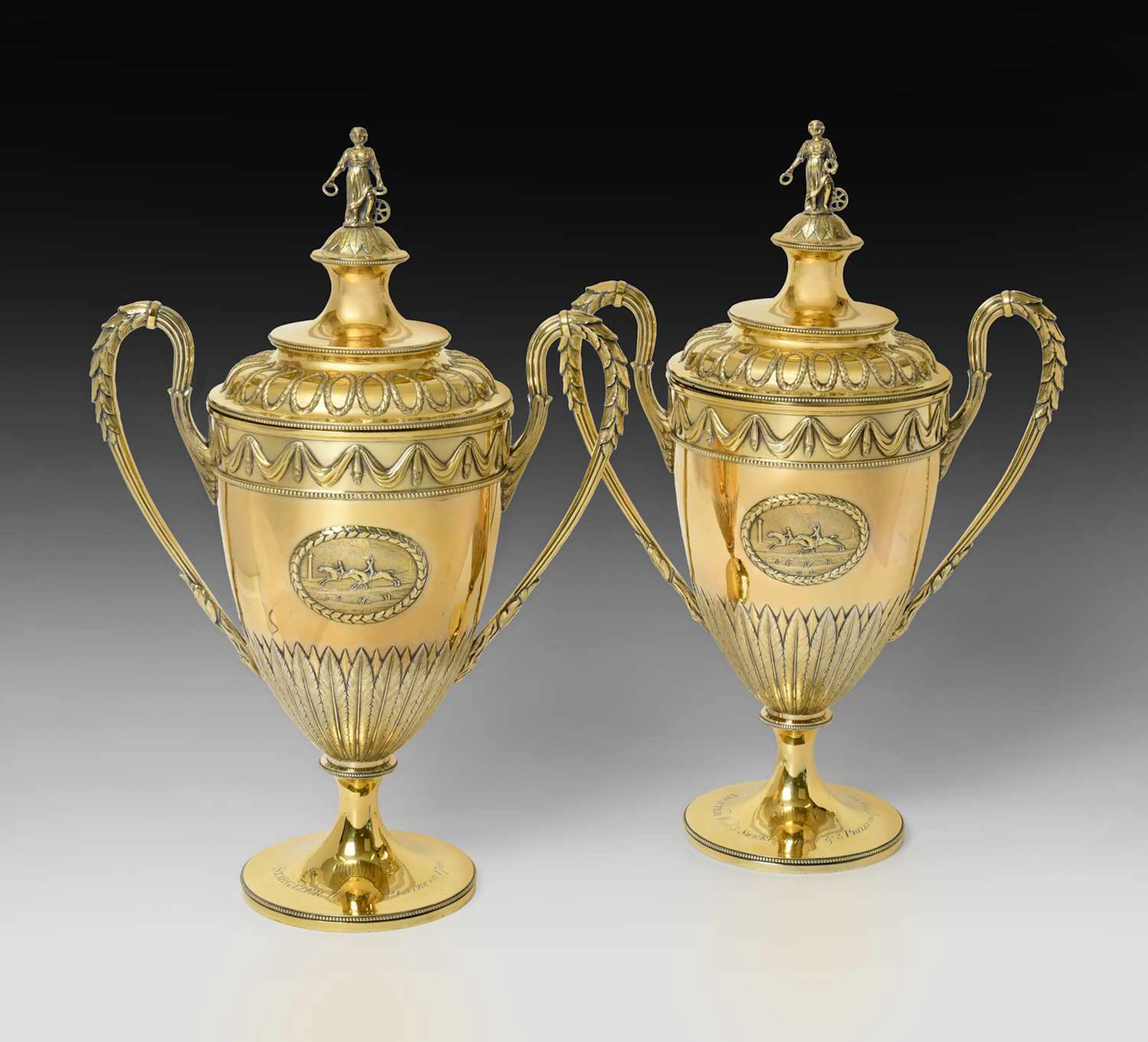 A Pair of George III Silver-Gilt Two-Handled Cups and Covers by George