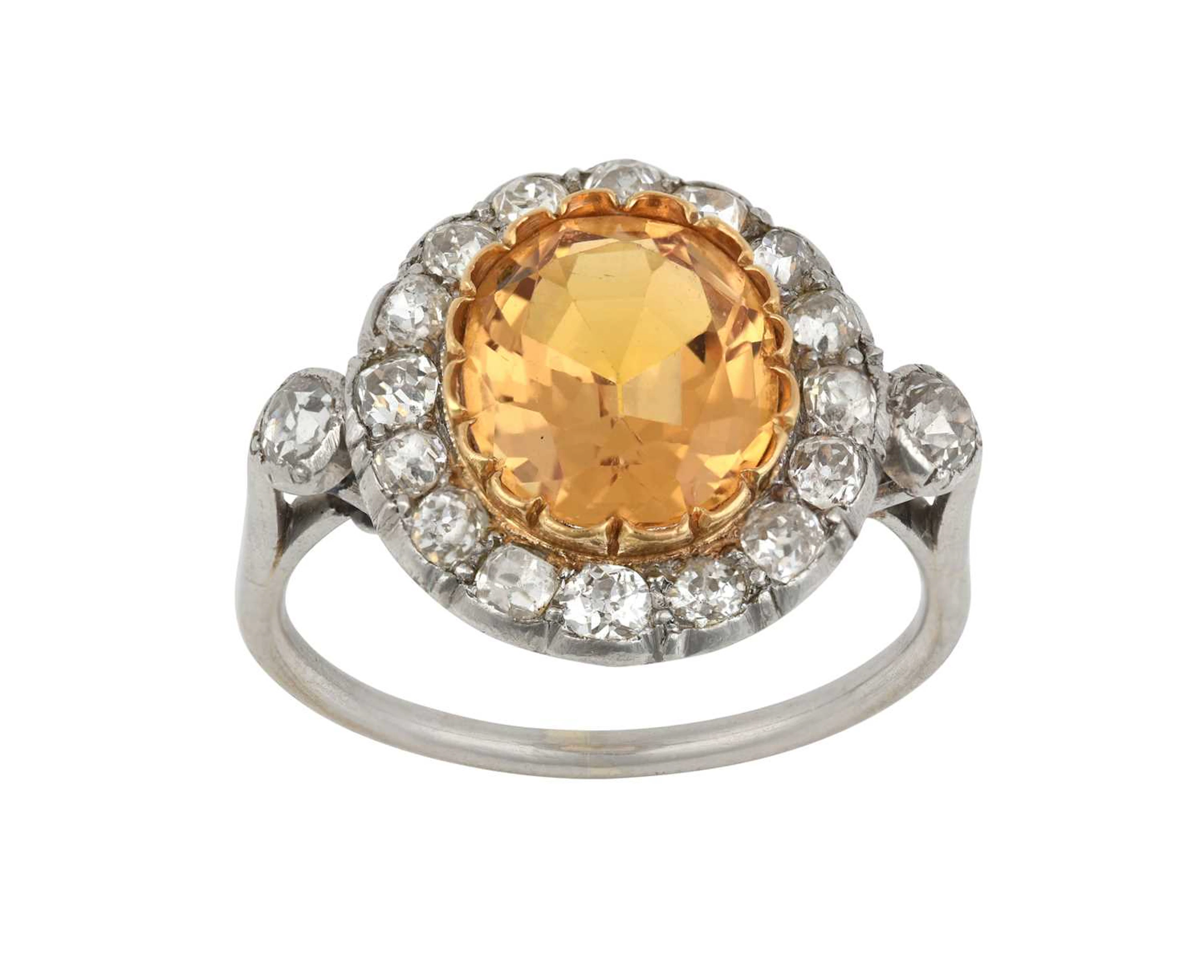 A Topaz and Diamond Ring
