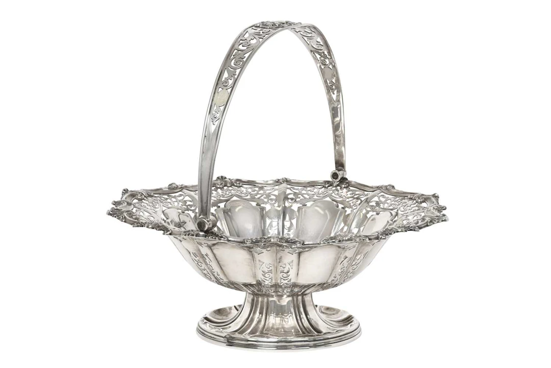An Edward VII Silver Basket by Walker and Hall, Sheffield, 1908, by