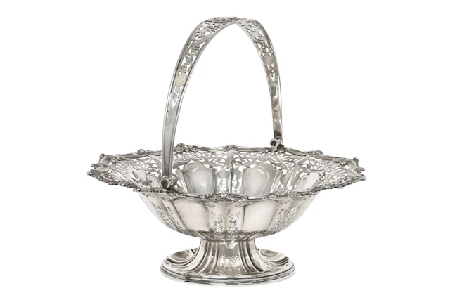 An Edward VII Silver Basket by Walker and Hall, Sheffield, 1908, by