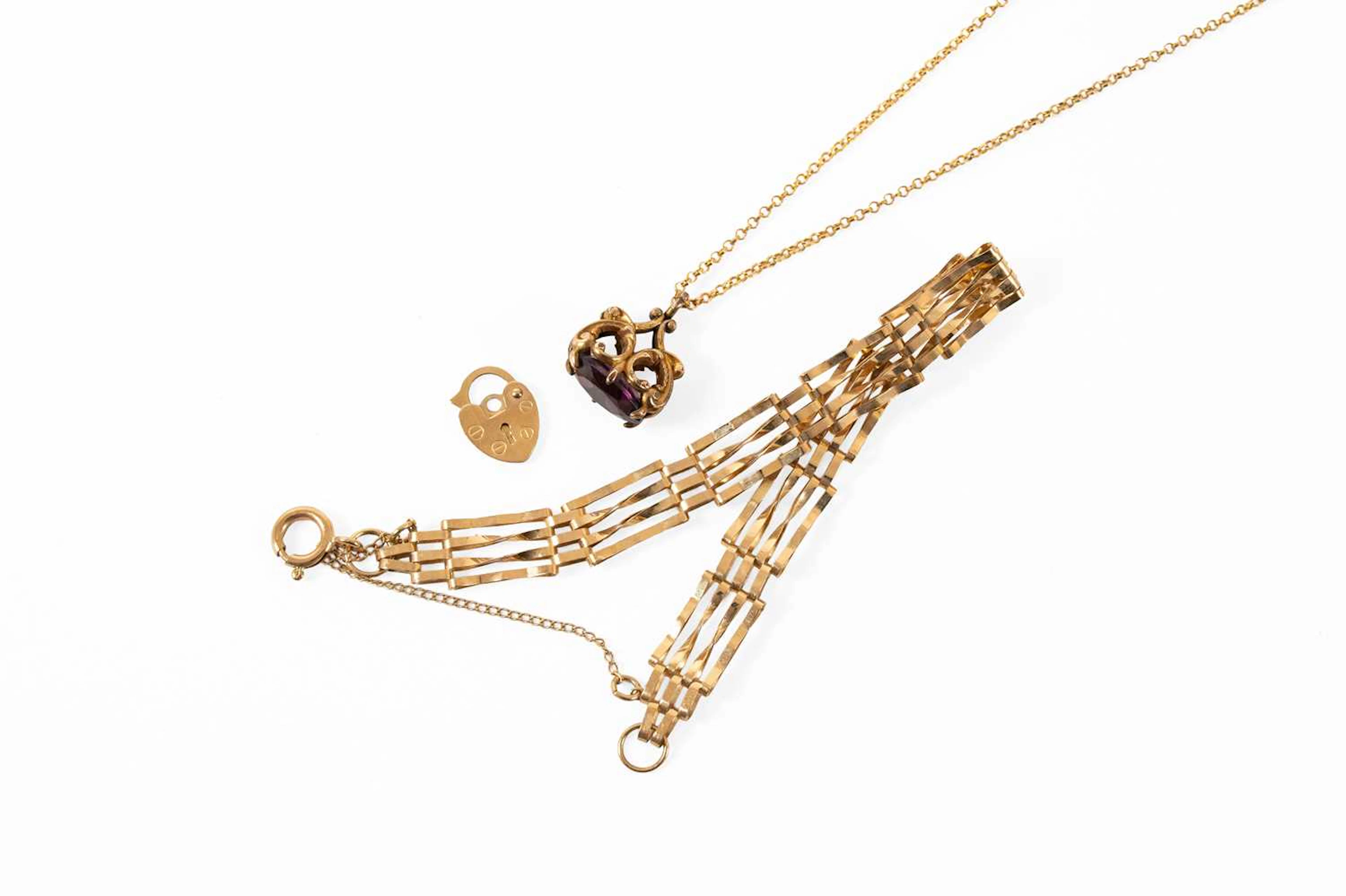 A 9 Carat Gold Gate Link Bracelet, A Purple Stone Pendant on Chain