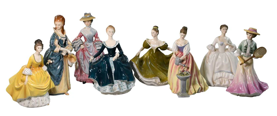 A Collection of Royal Doulton Porcelain Figures of Ladies