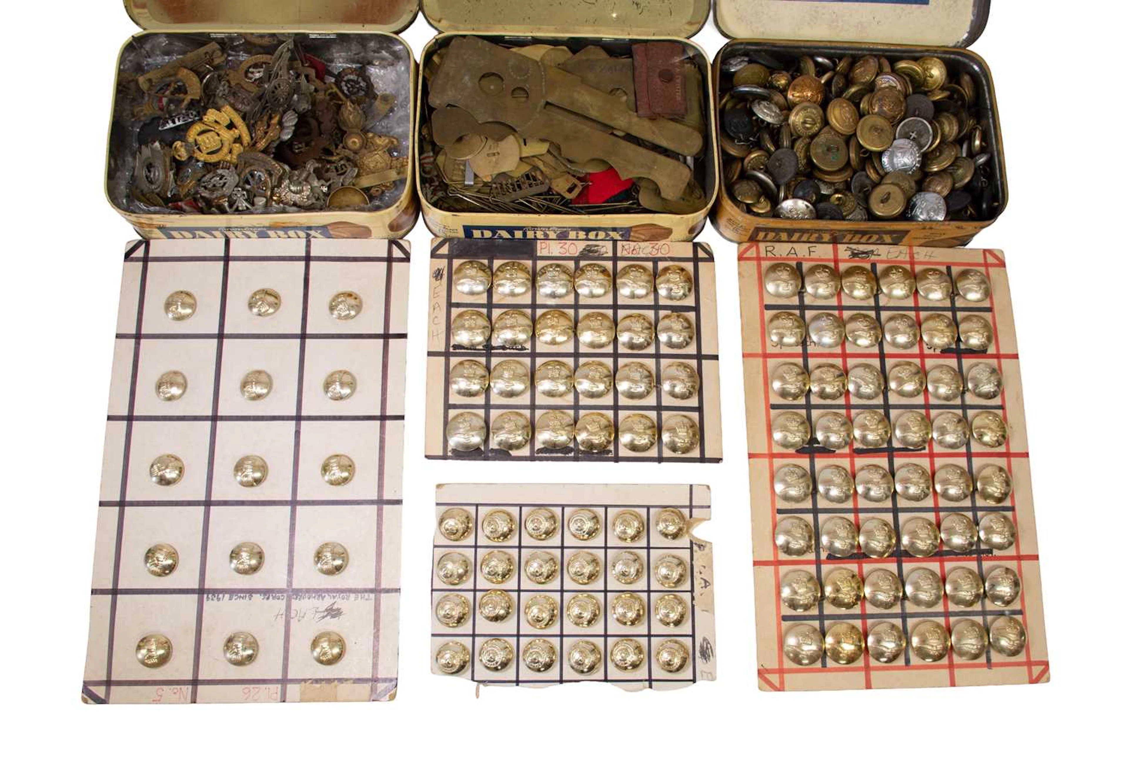 A Collection of Approximately Fifty Military Cap and Collar Badges, also