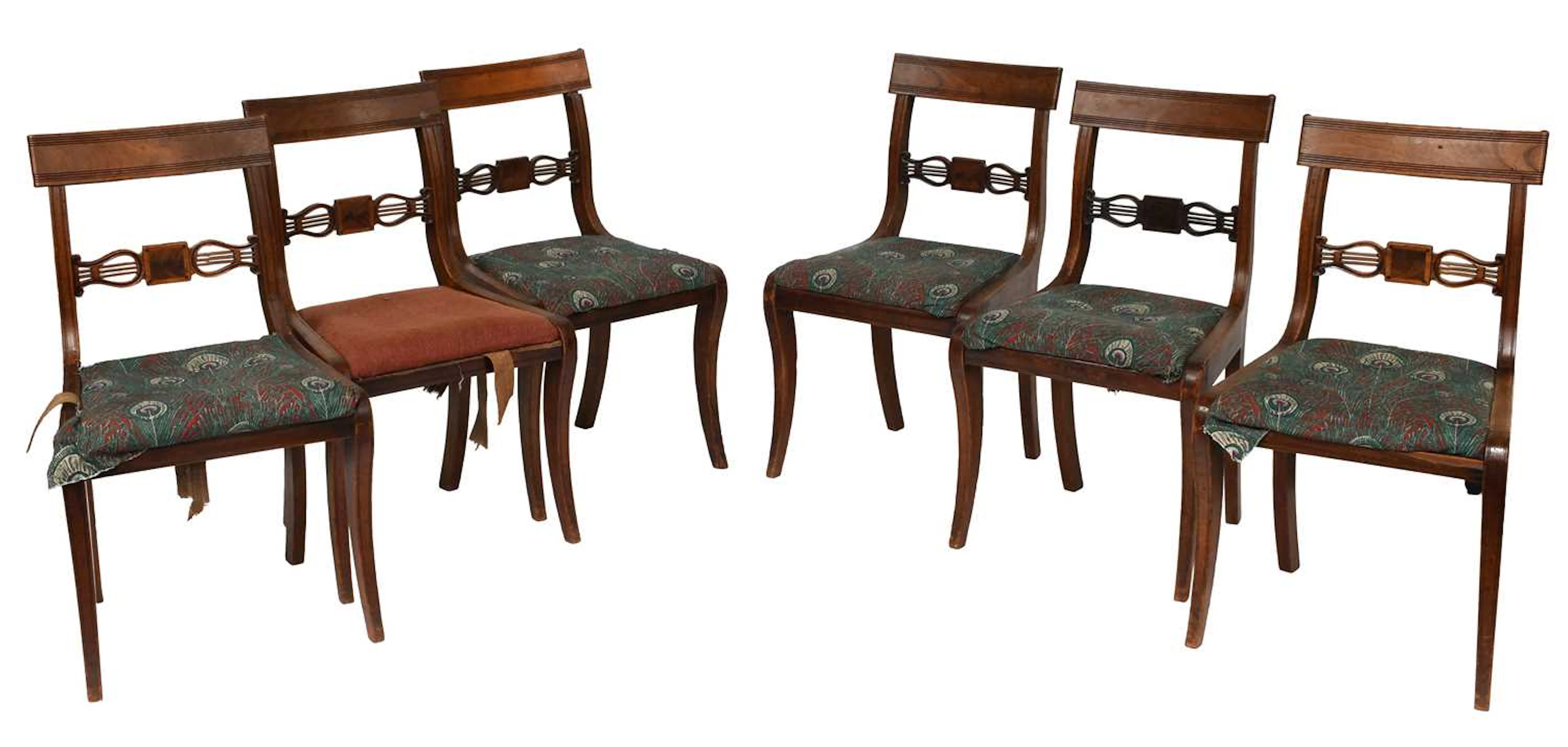 A Set of Six Regency Mahogany Sabre Leg Dining Chairs