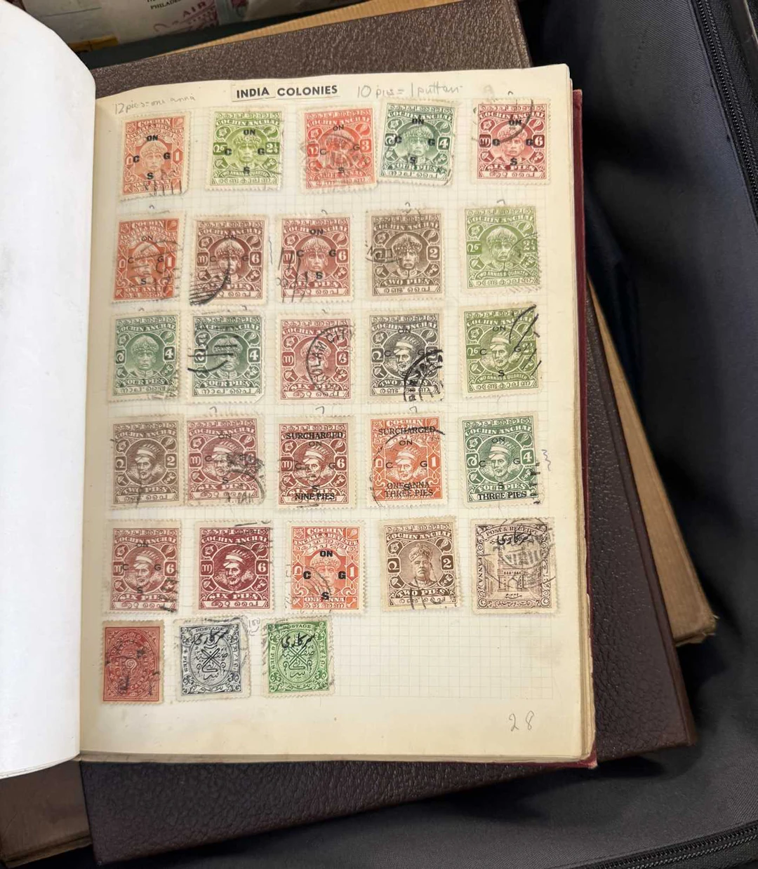 Stamp Accumulation in a Grey Suitcase