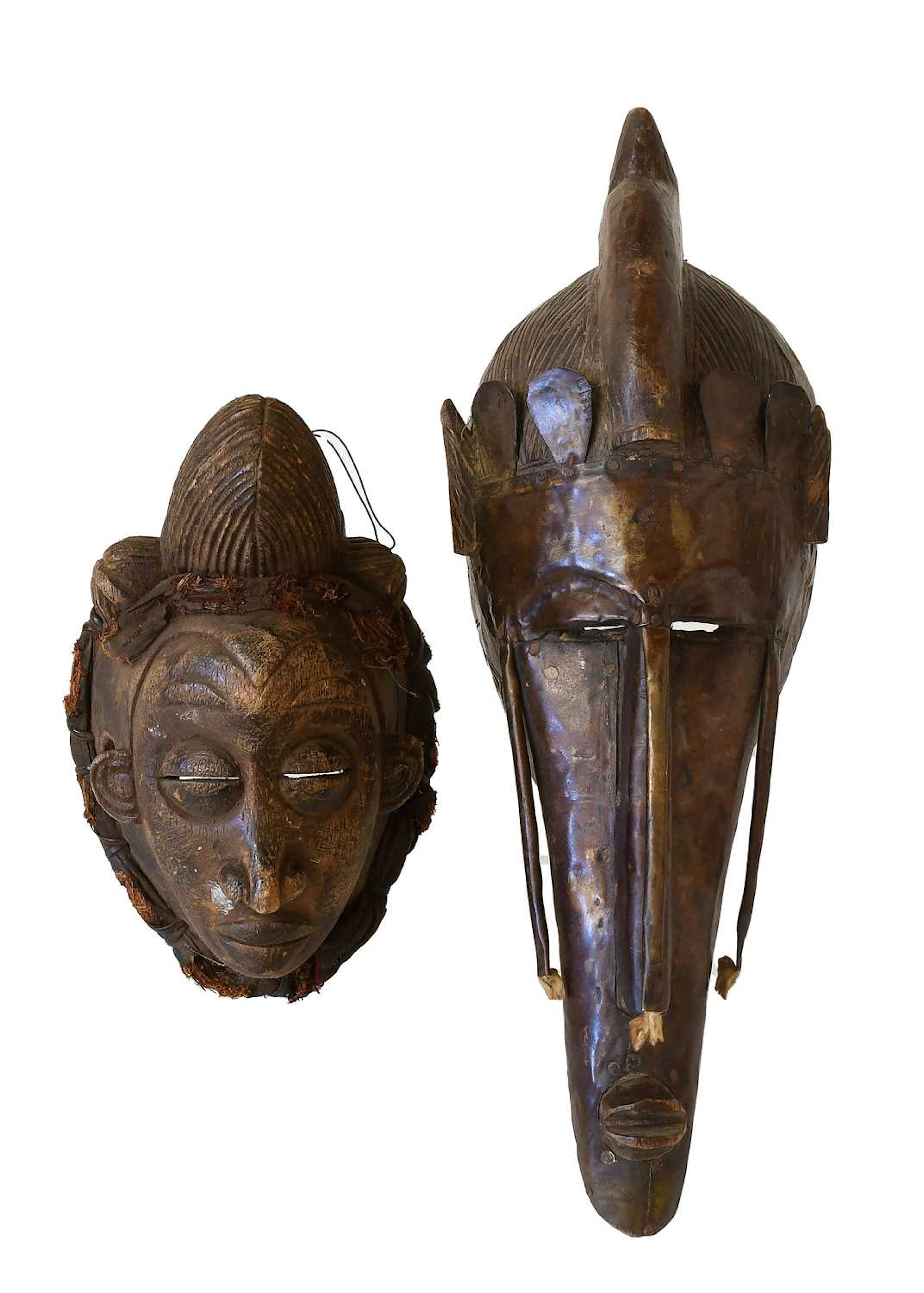 A Punu Small Carved Wood Face Mask, Gabon, a Marka Carved Wood and