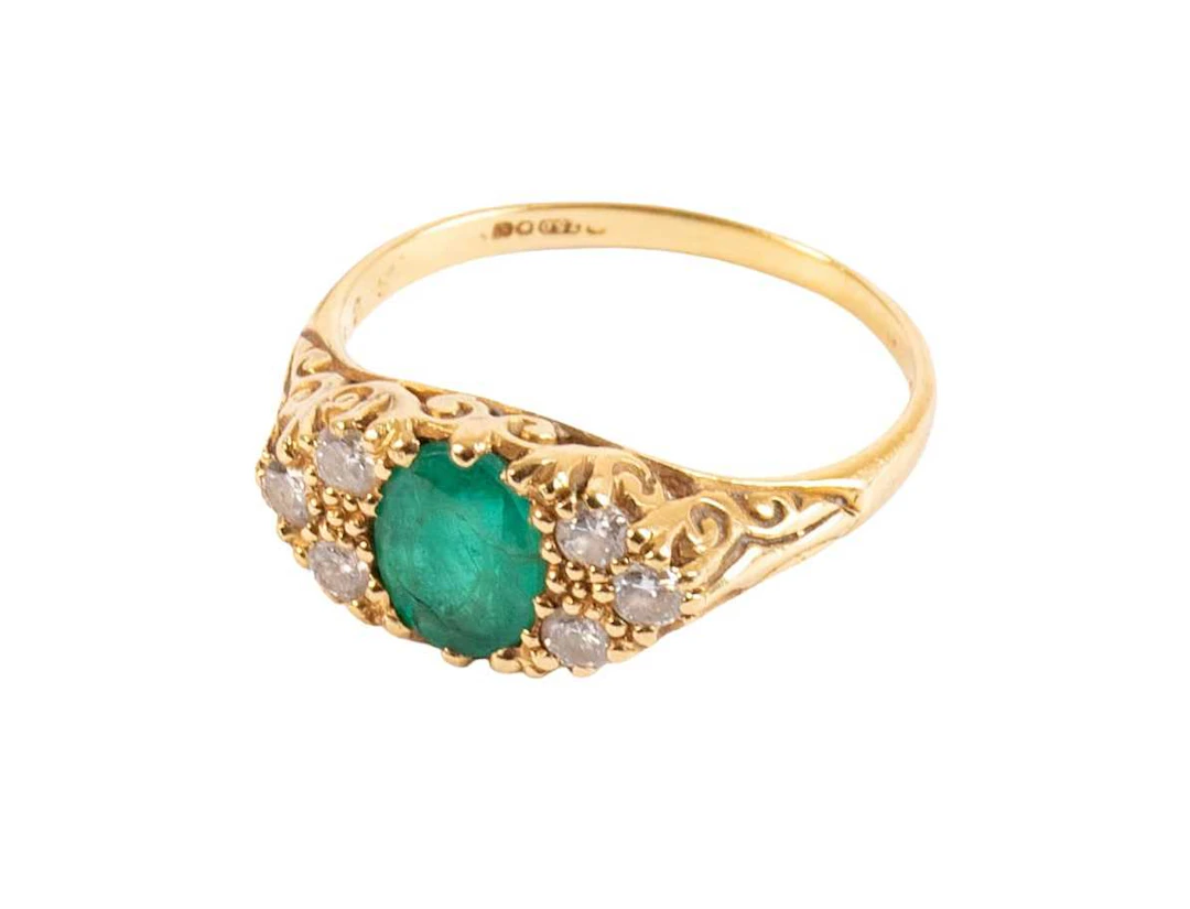An 18 Carat Gold Emerald and Diamond Ring