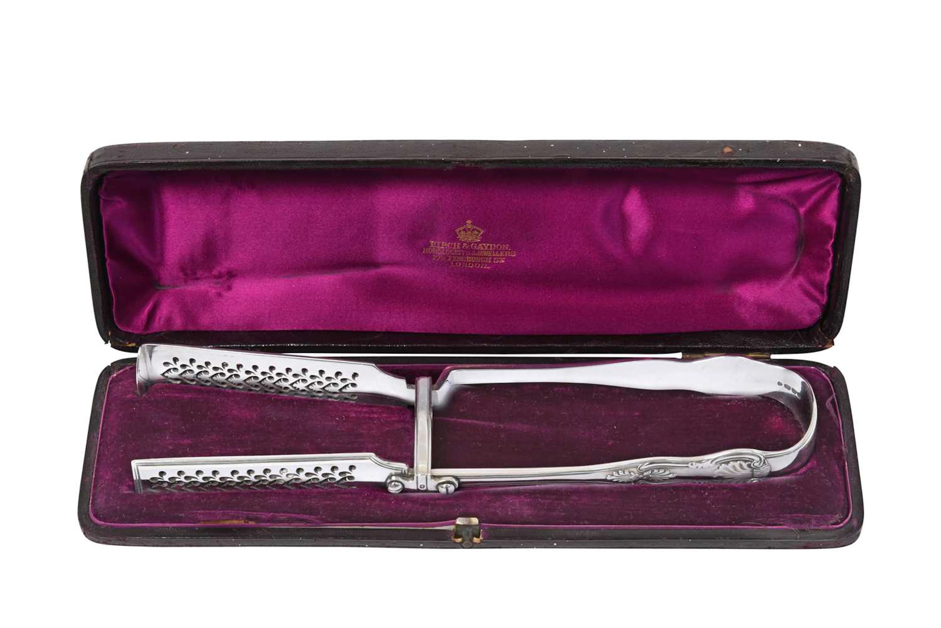 A Pair of Victorian Silver Asparagus-Tongs by George Adams, London