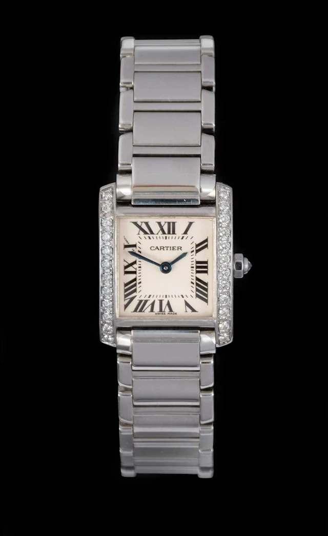 Cartier: A Lady's Stainless Steel Diamond Set Wristwatch, signed Cartier